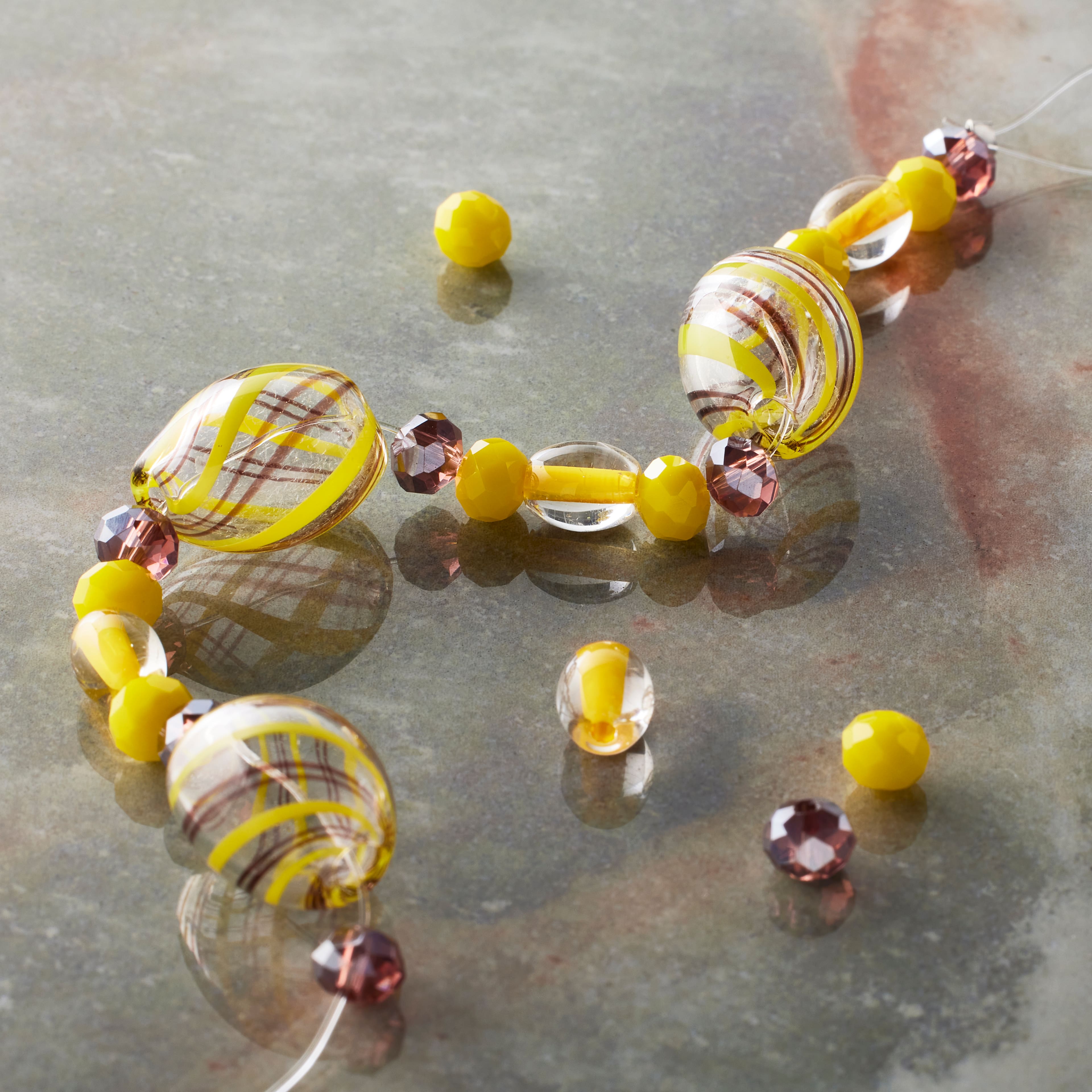Yellow Lampwork Glass Stripe Oval Beads by Bead Landing™