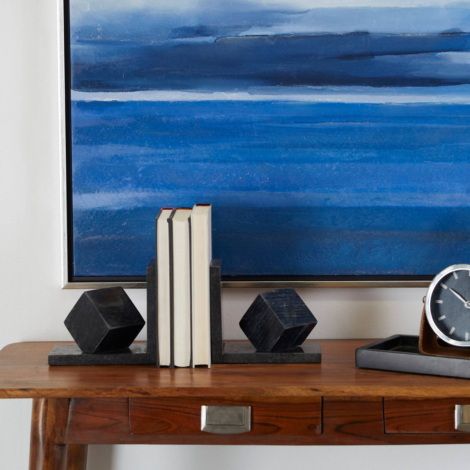 CosmoLiving by Cosmopolitan 6" Black Marble Orb Bookends Set