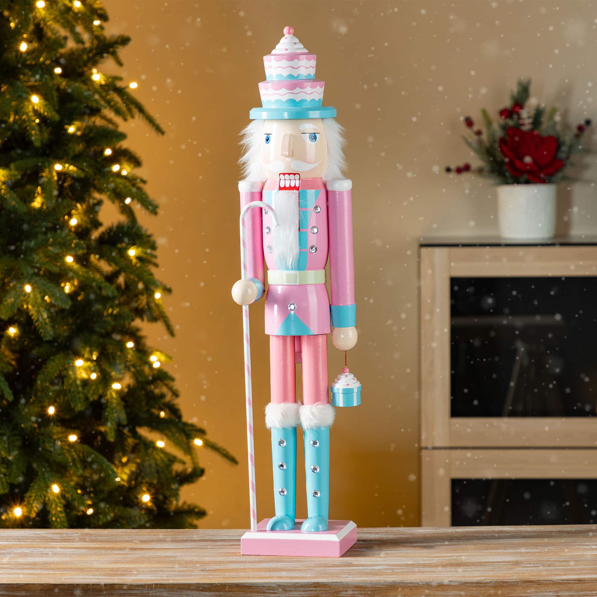 Glitzhome&#xAE; 24&#x22;H Wooden Christmas Pink Cake Nutcracker