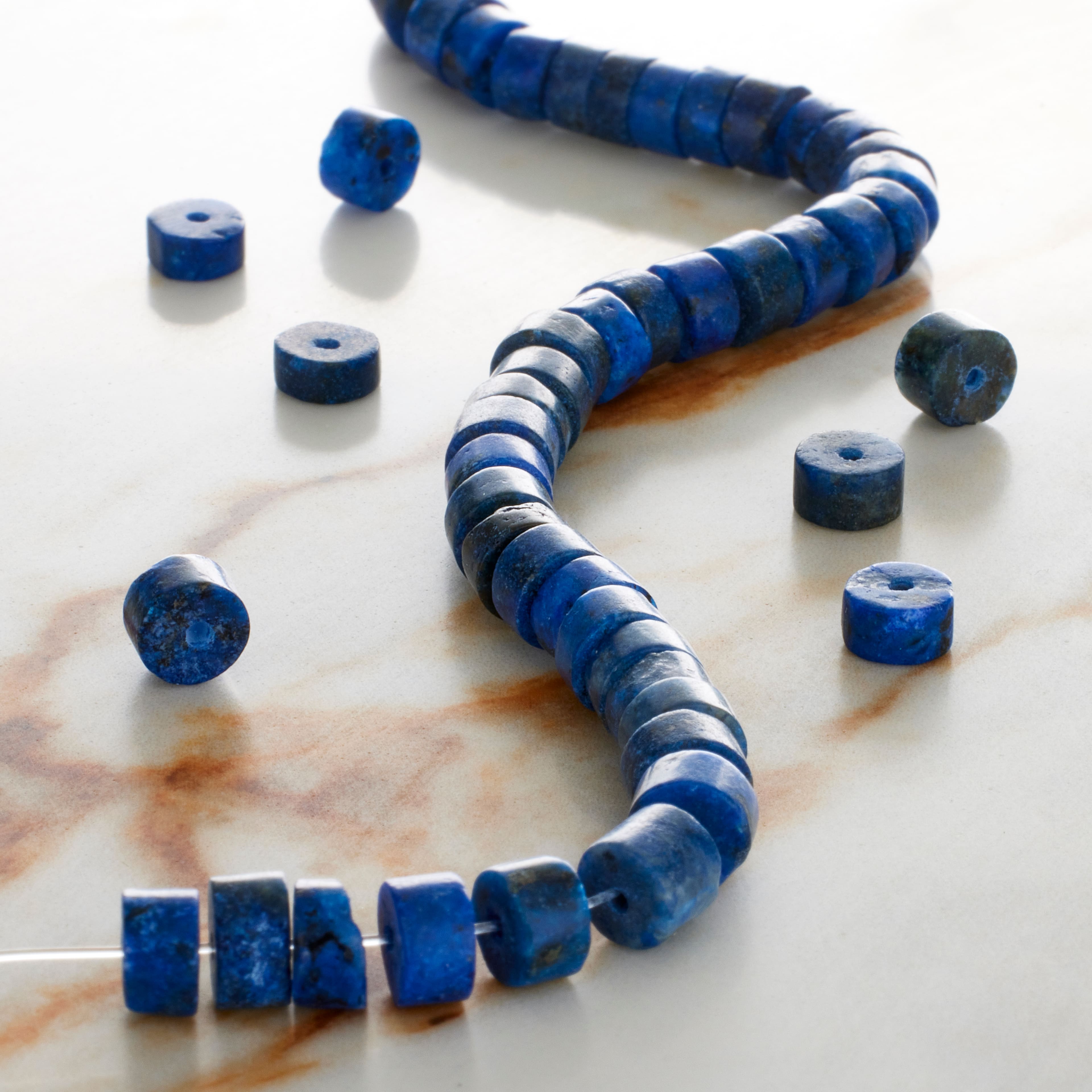 12 Pack: Blue Dyed Lapis Heishi Beads by Bead Landing