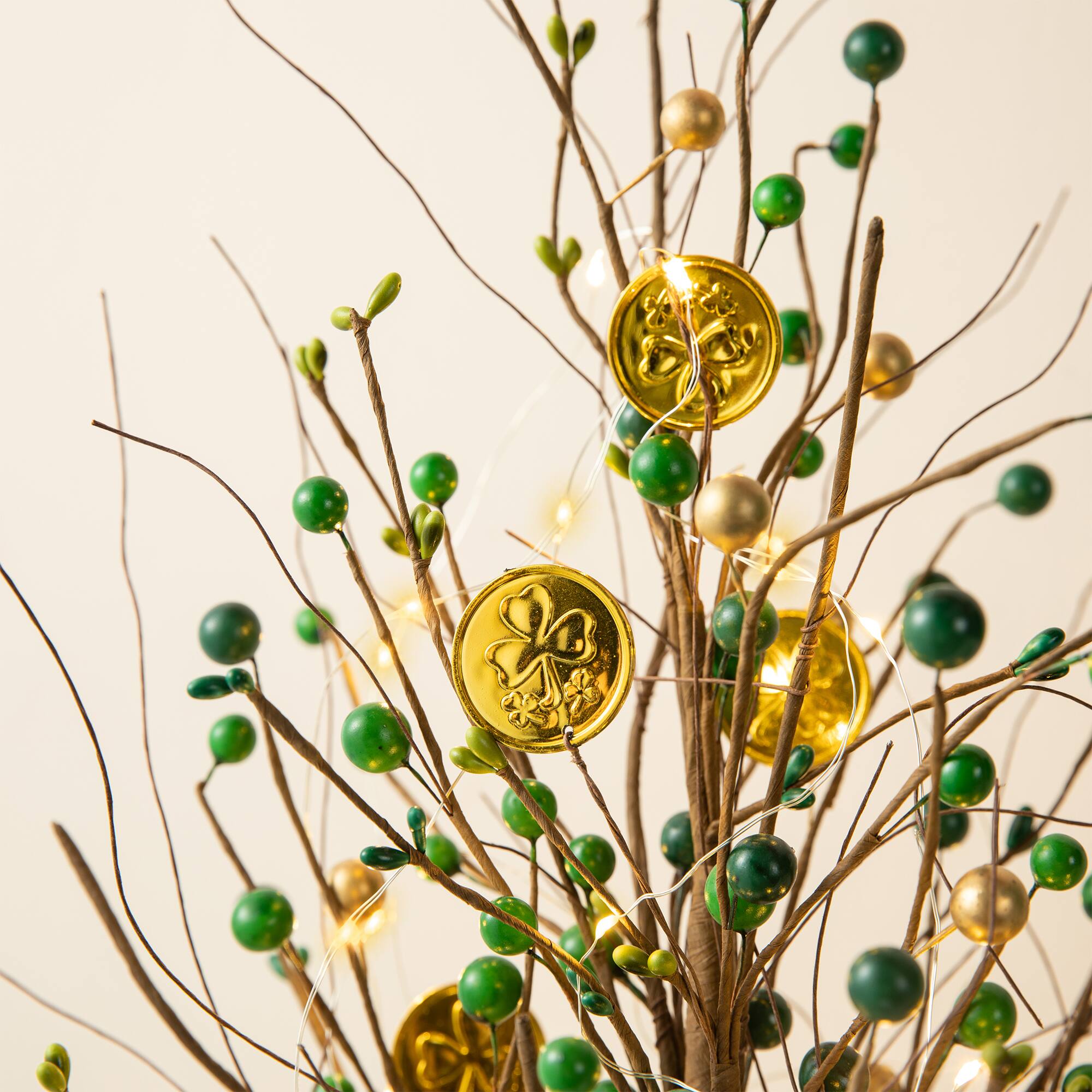 Glitzhome® 21" Lighted St. Patrick's Gold Coin Table Tree