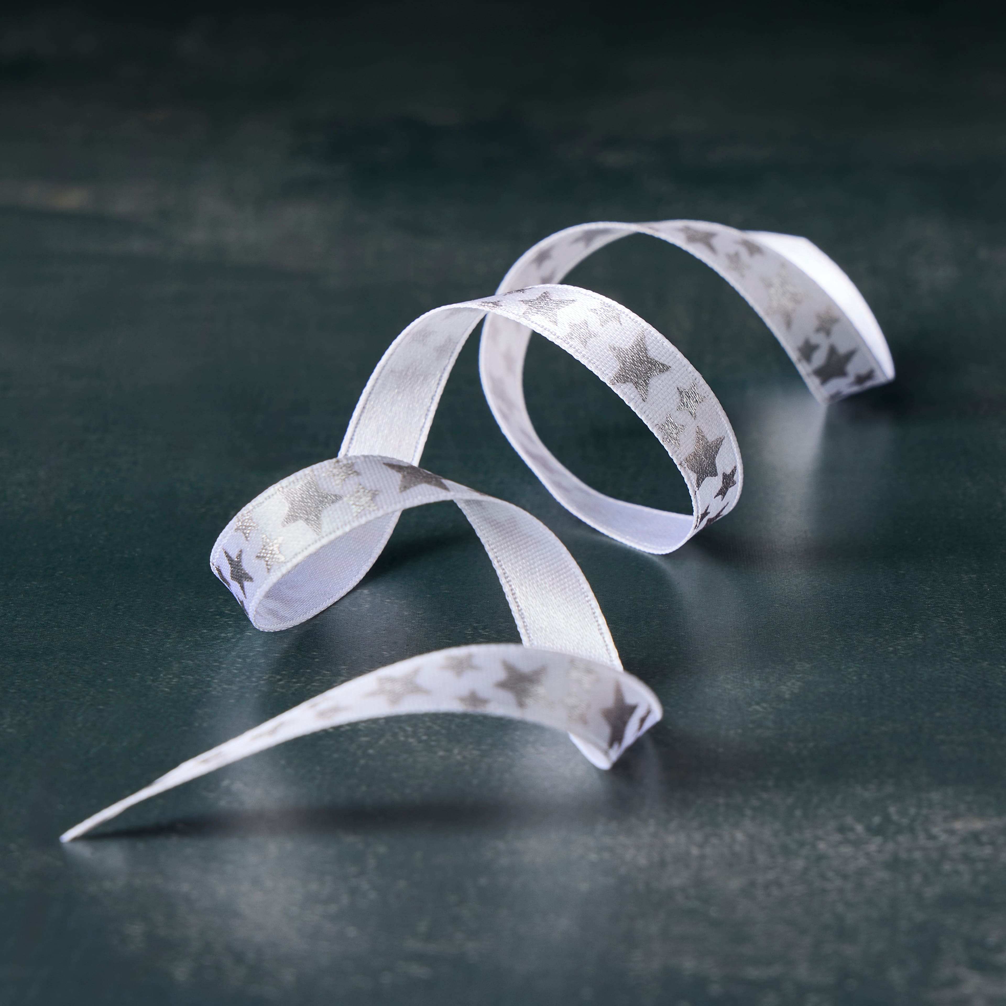 3/8&#x22; x 7yd. White &#x26; Silver Foil Stars Satin Ribbon by Celebrate It&#xAE; Classic