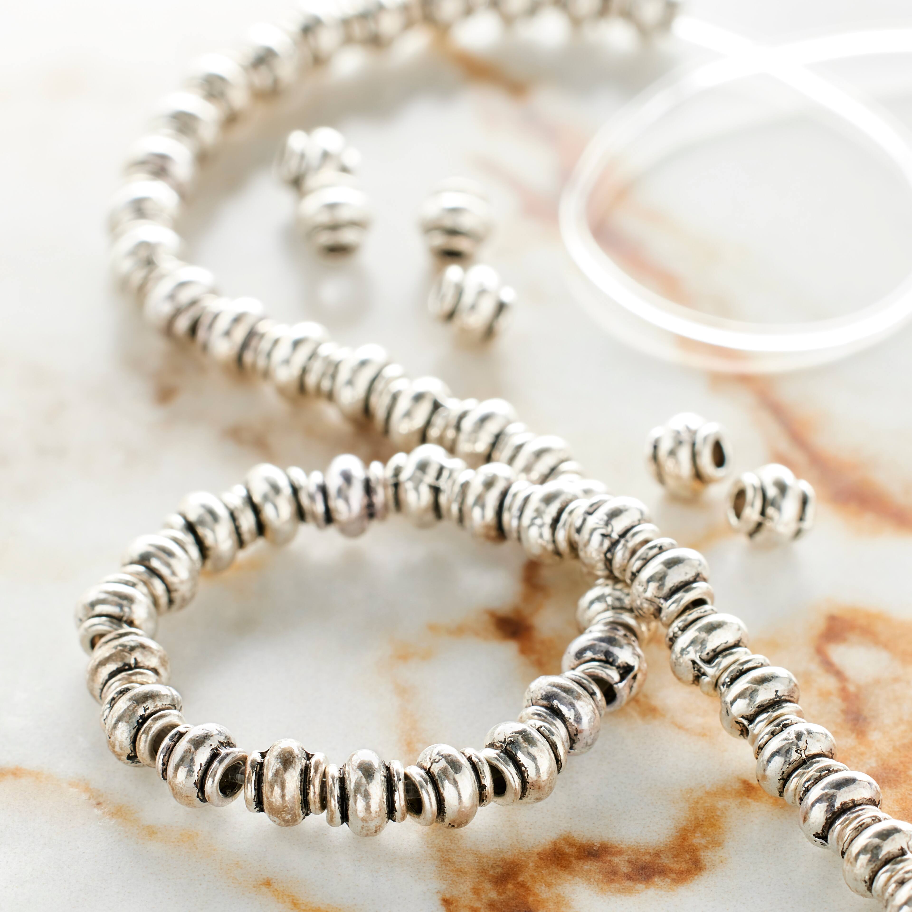 12 Pack: Silver Plated Smooth Rondelle Beads, 4mm by Bead Landing™