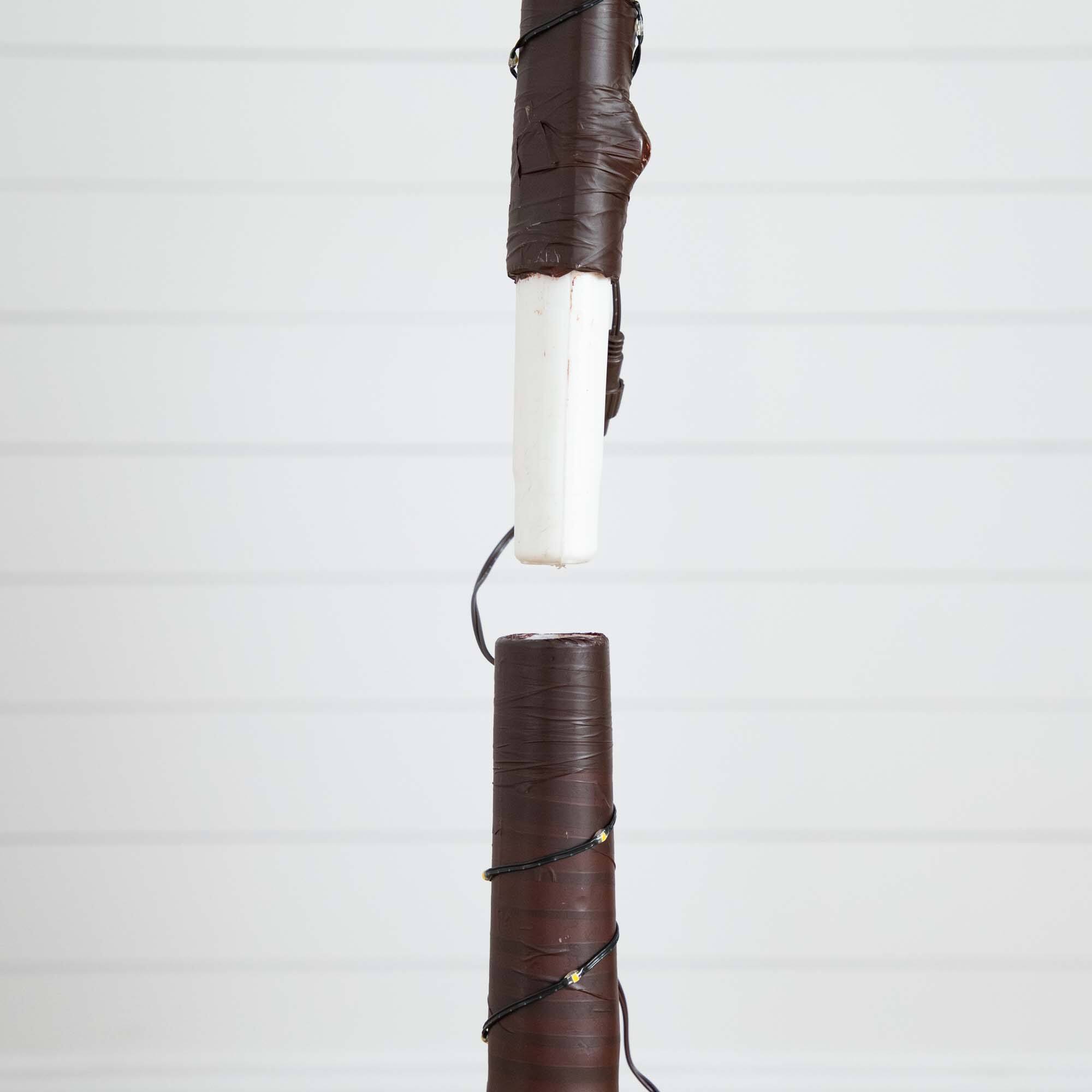 4ft. Pre-Lit UV Resistant Artificial Palm Tree with Warm White LED Lights