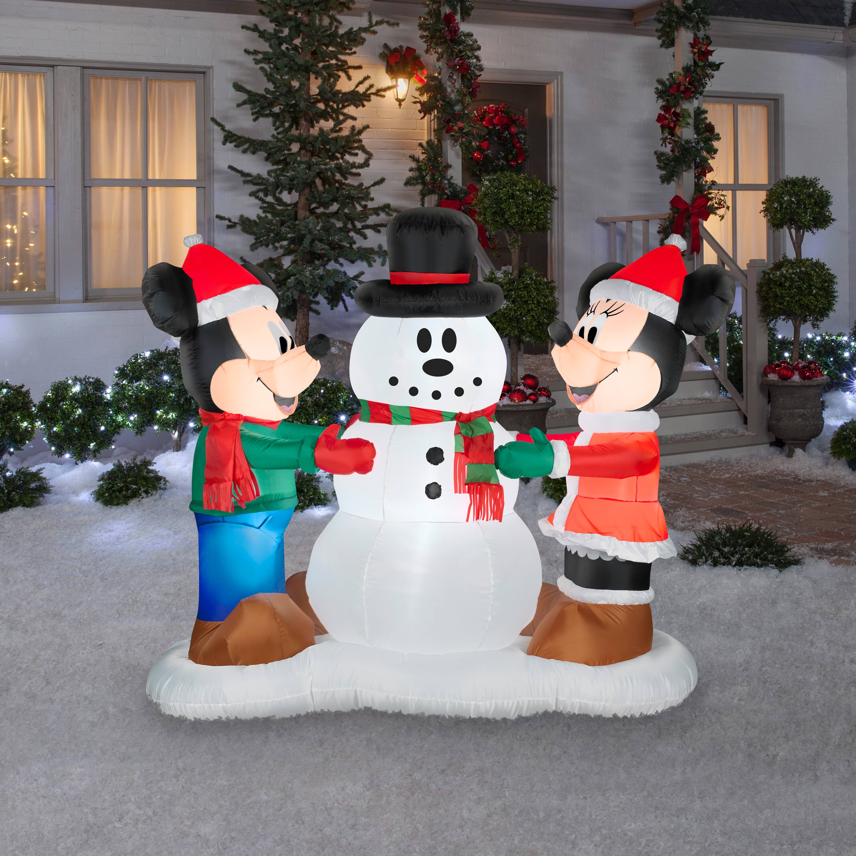5ft. Airblown® Inflatable Christmas Mickey & Minnie Decorating Snowman Scene