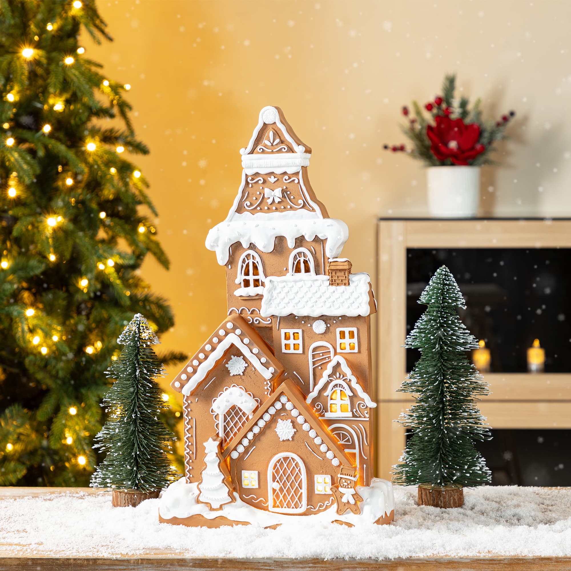 Glitzhome&#xAE; 17.75&#x22; Christmas Lighted Resin Gingerbread House Table Decor