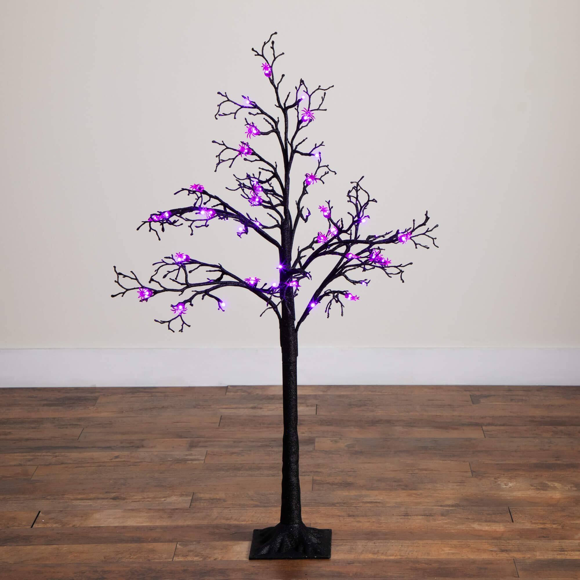 4ft. Pre-Lit Artificial Halloween Spider Twig Tree with 48 Purple LED Lights