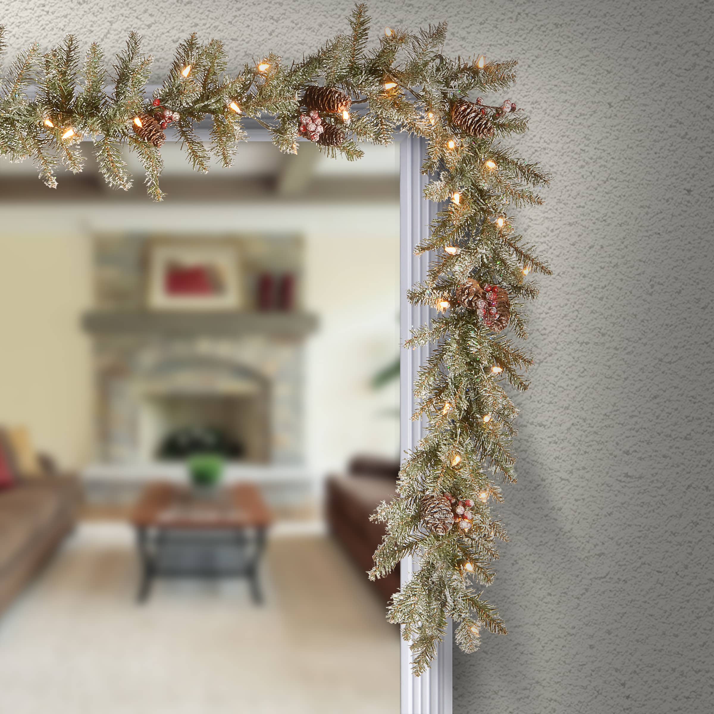 9&#x27; X 10&#x22; Pre-lit Dunhill&#xAE; Fir Artificial Christmas Garland with Snow, Red Berries, Cones and 50 Clear Lights