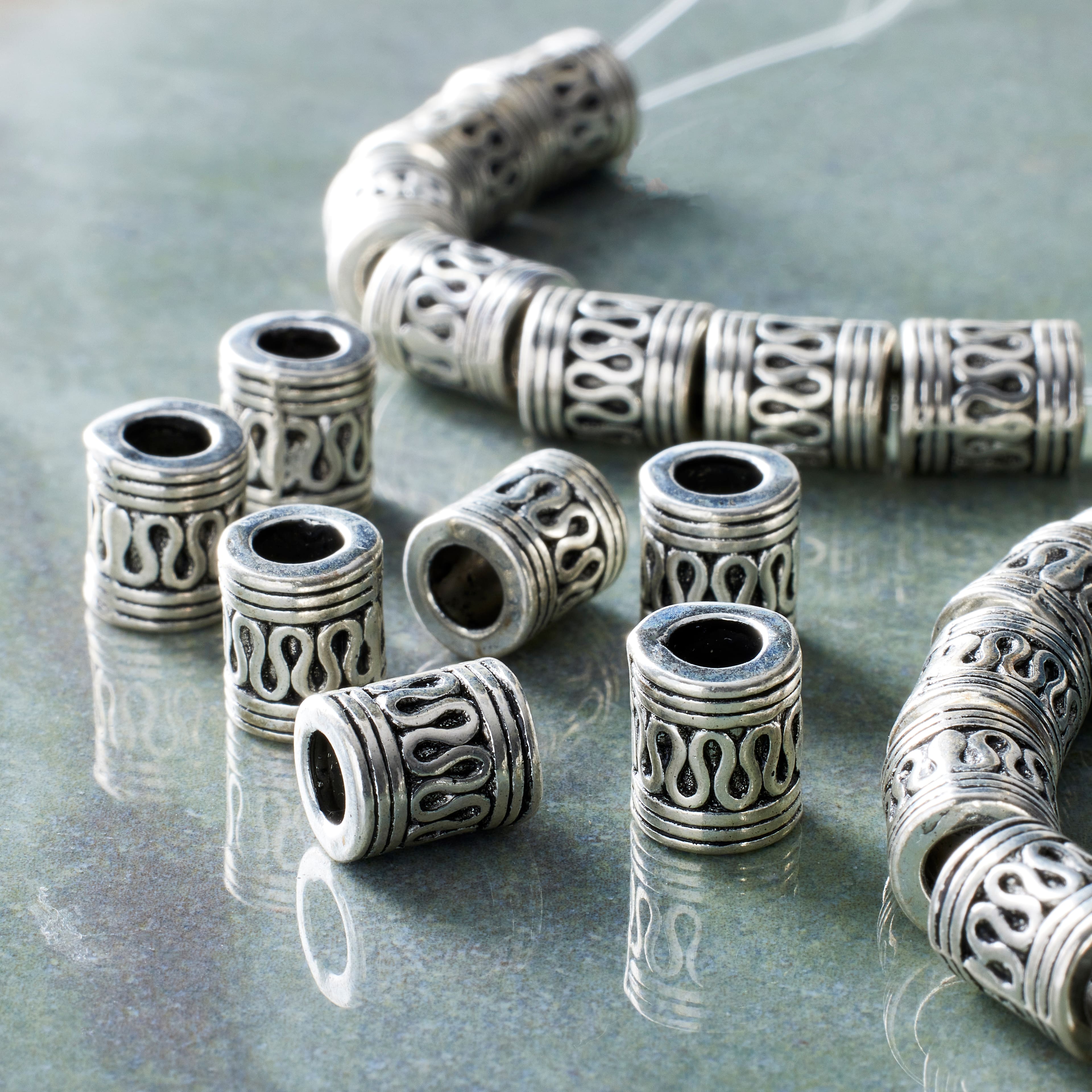 12 Pack: Silver Snake Carved Metal Tube Beads, 9mm by Bead Landing™