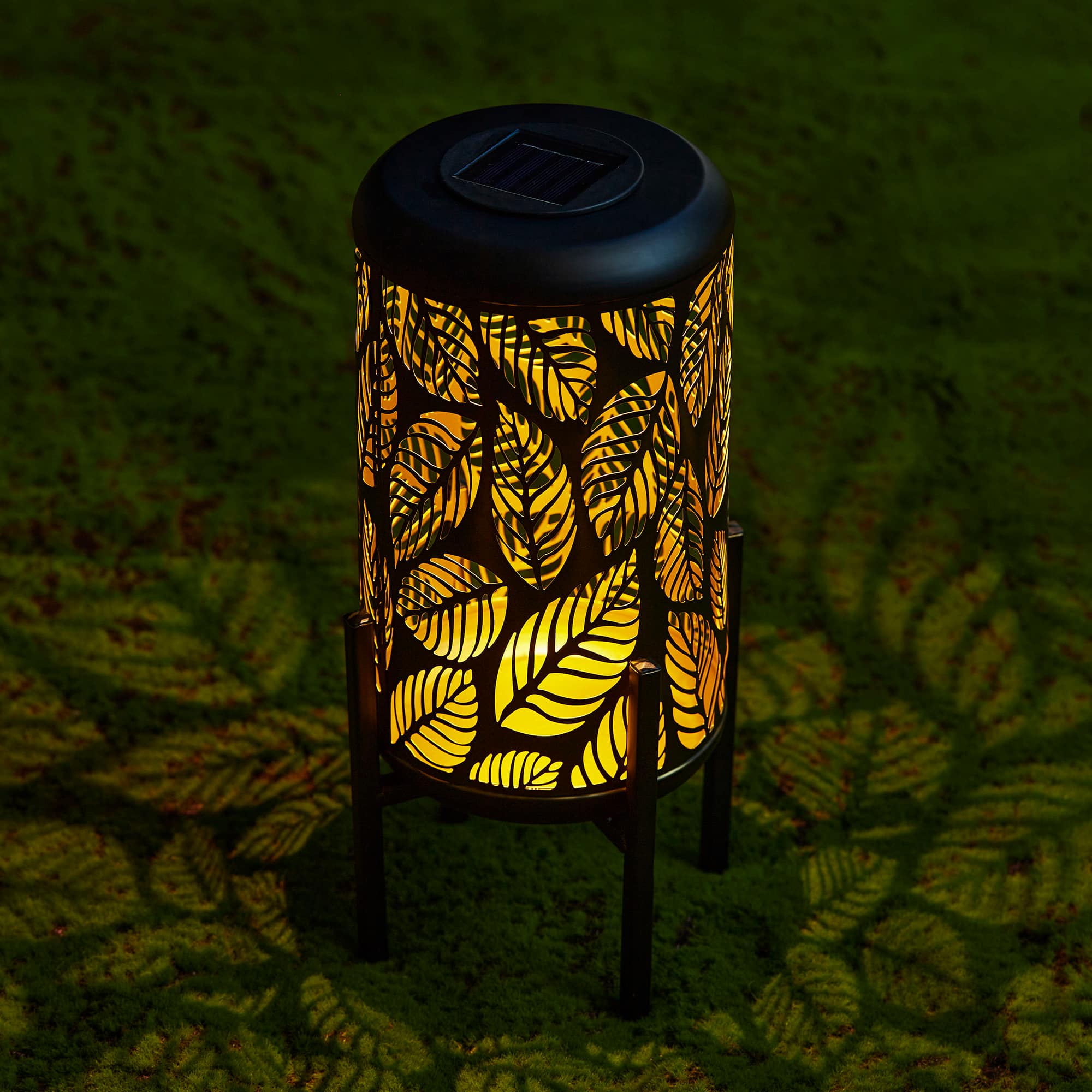 Glitzhome&#xAE; 14.25&#x22; Black Metal Cutout Leaves Pattern Solar Powered LED Outdoor Lantern