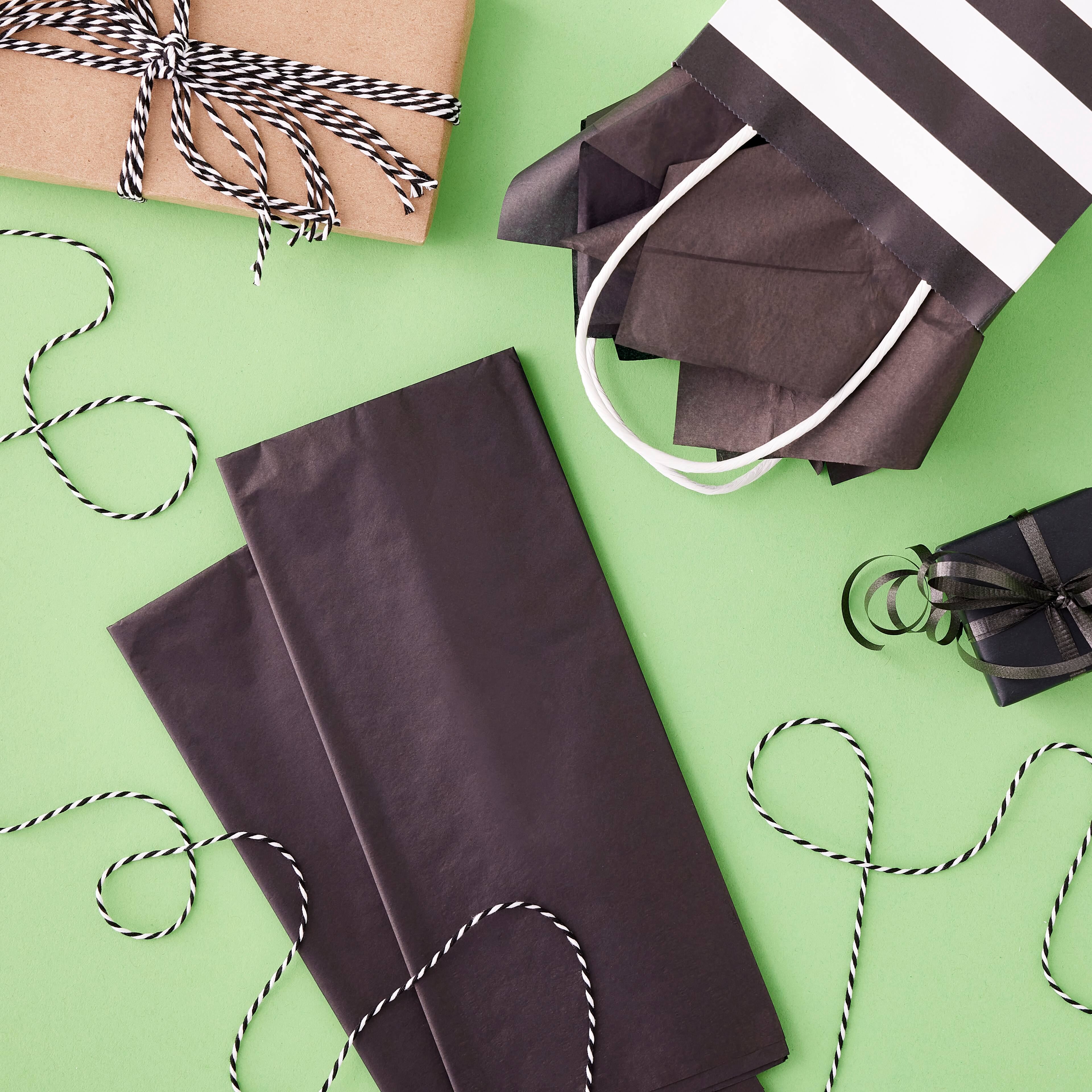 24 Packs: 12 ct. (288 total) Black Tissue Paper by Celebrate It&#x2122;