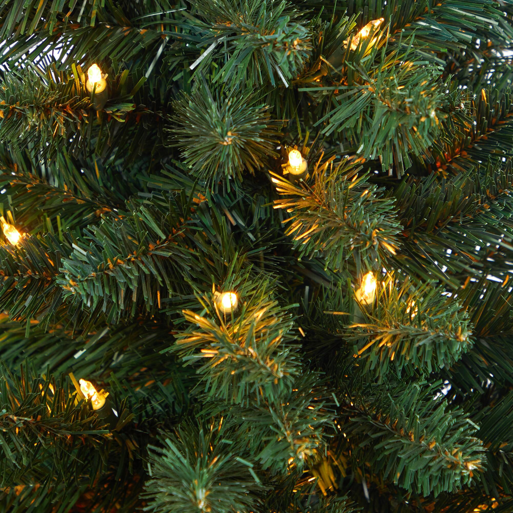 4.5ft. Pre-Lit Northern Rocky Spruce Artificial Christmas Tree in Tower Planter, Clear Lights