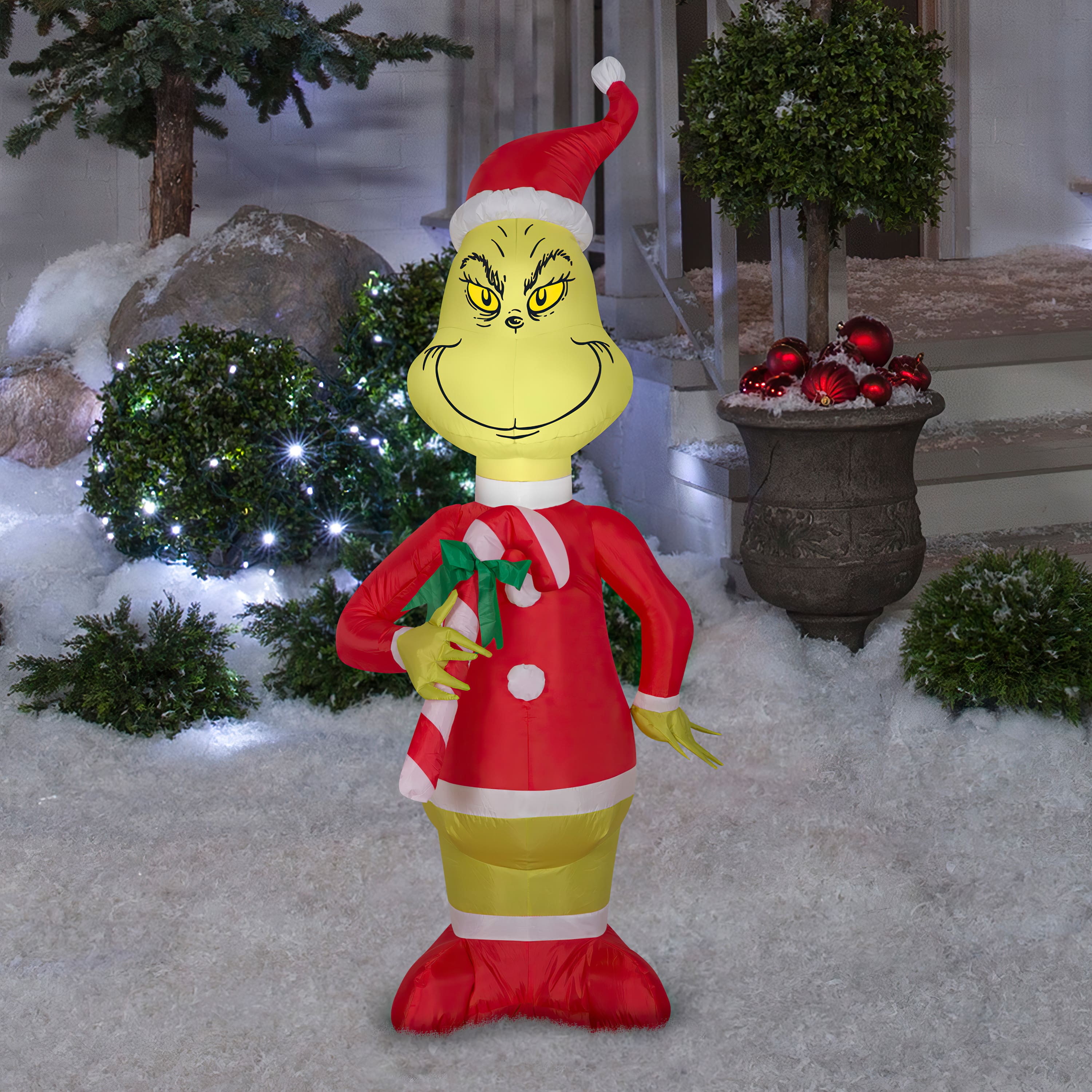 4ft. Airblown&#xAE; Inflatable Grinch with Red &#x26; White Candy Cane