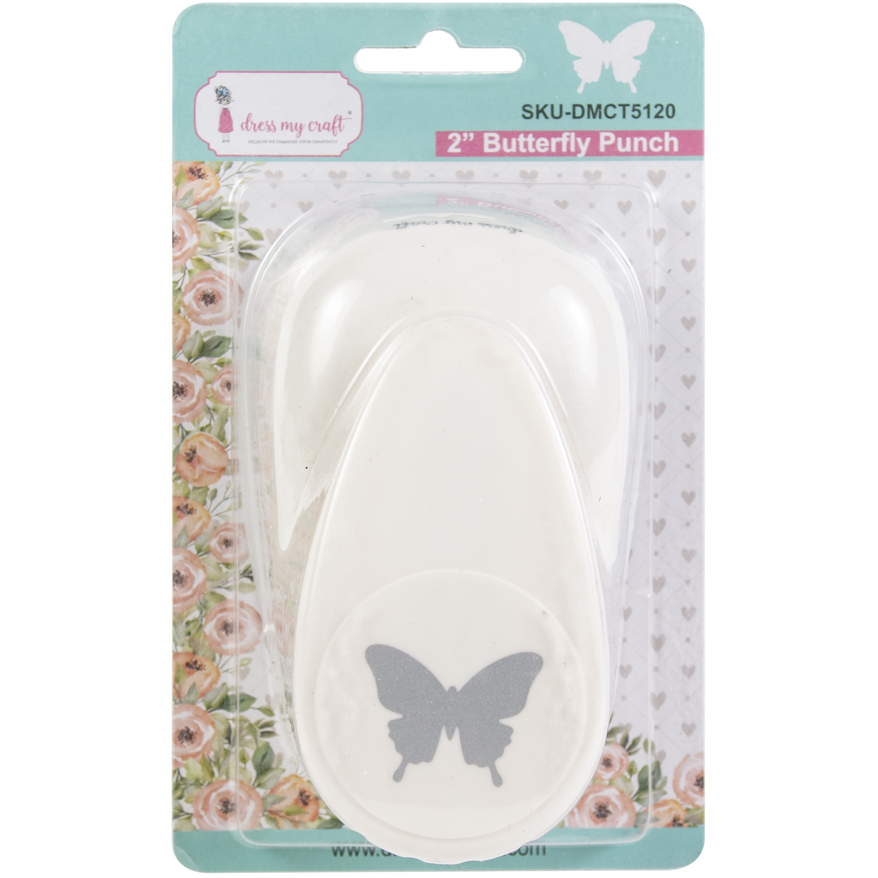 A Butterfly punched out from Design Paper on a Manilla Tag