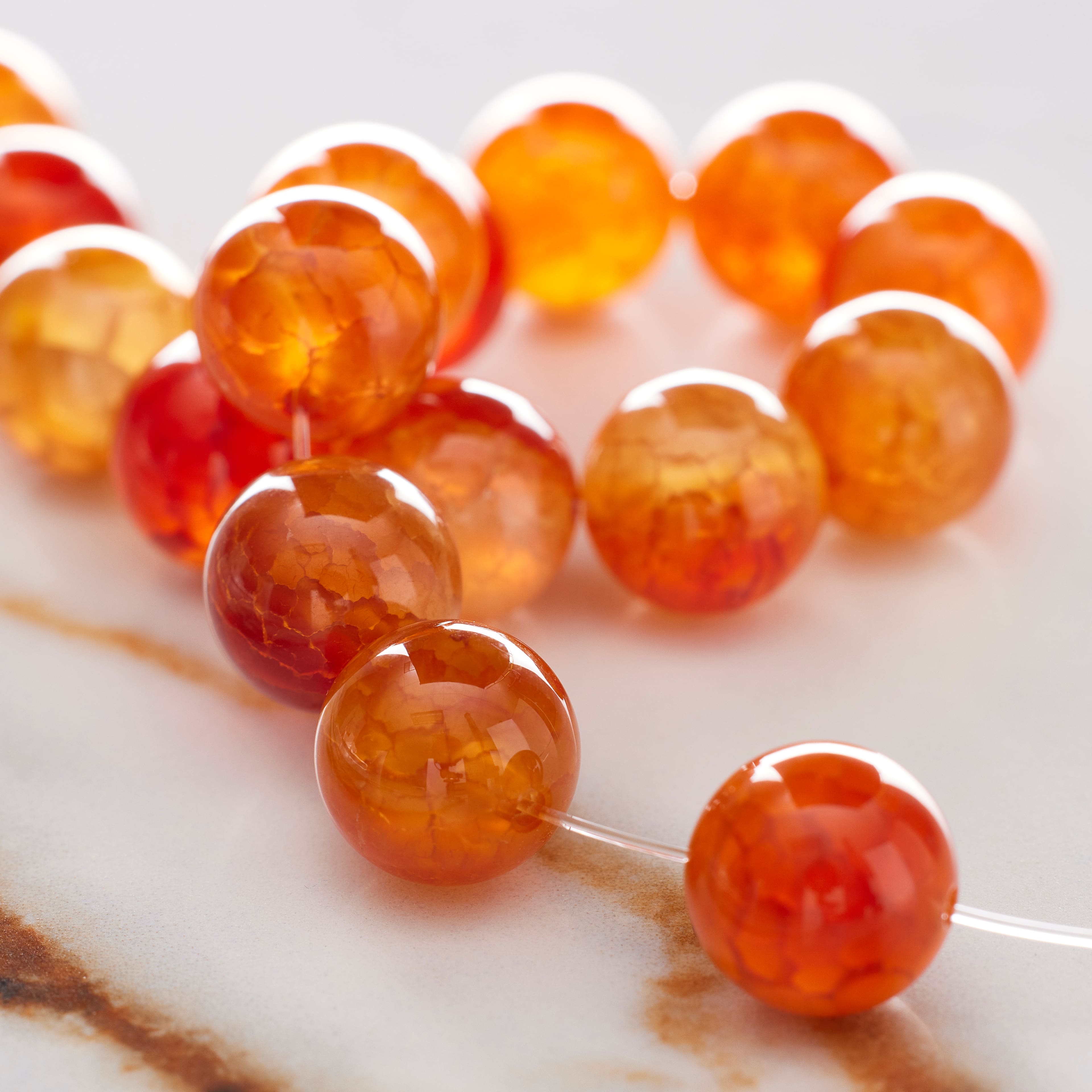 12 Pack: Amber Dyed Fire Agate Round Beads, 10mm by Bead Landing™