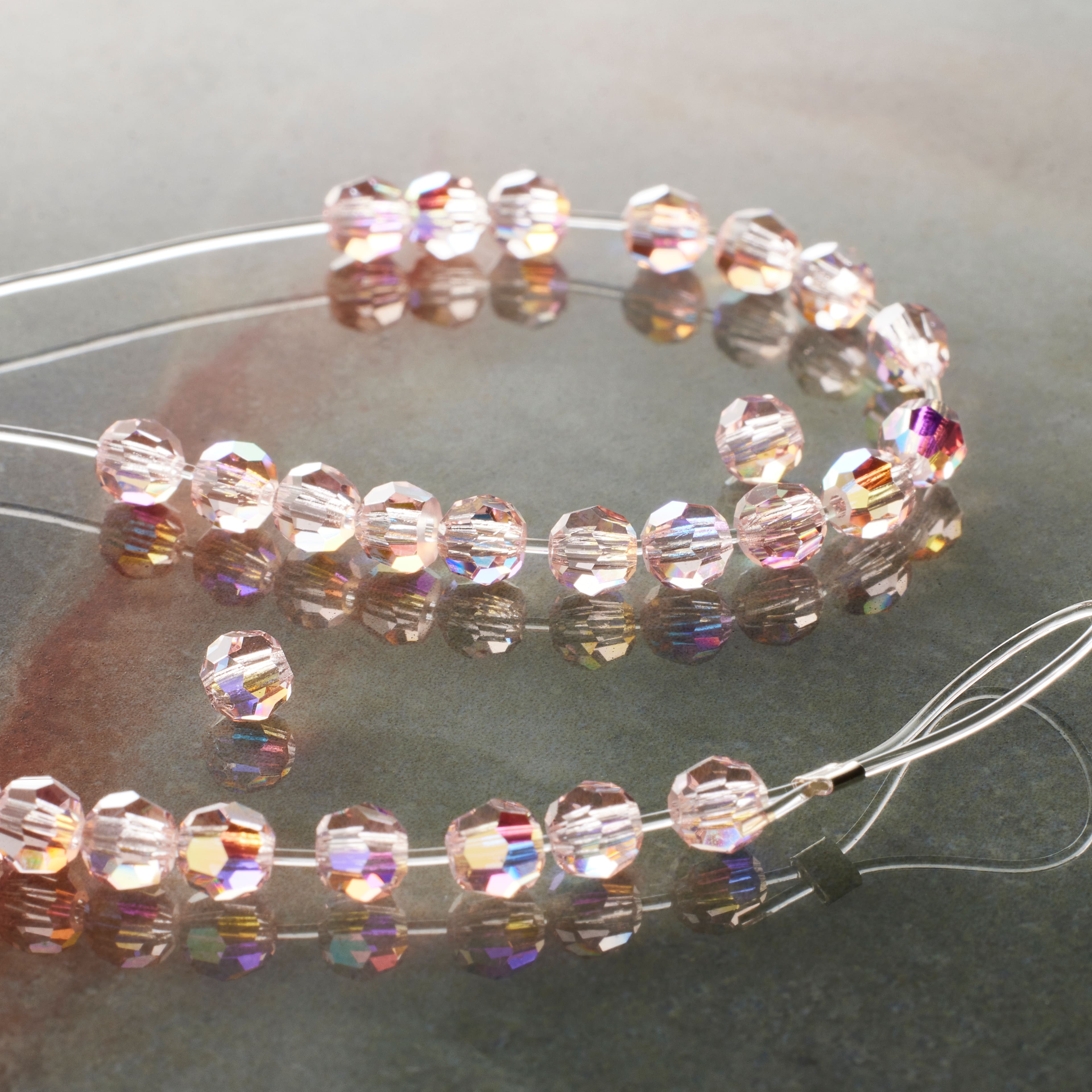 12 Packs: 31 ct. (372 total) Preciosa Glass Crystal Round Beads, 4mm by Bead Landing™