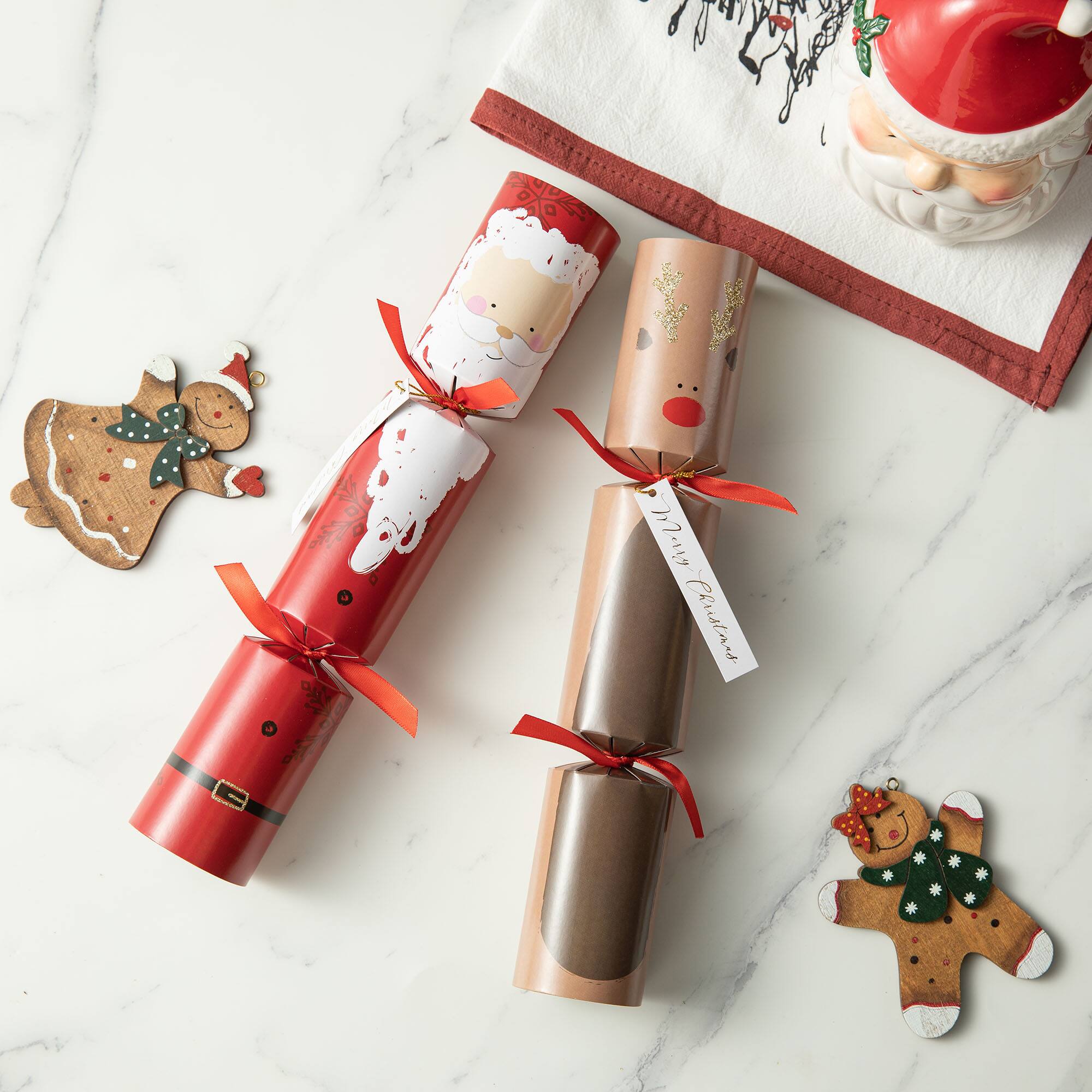 Glitzhome&#xAE; 12&#x22; Christmas Santa, Snowman, Penguin &#x26; Reindeer Party Cracker with Gift Contents, 6ct.