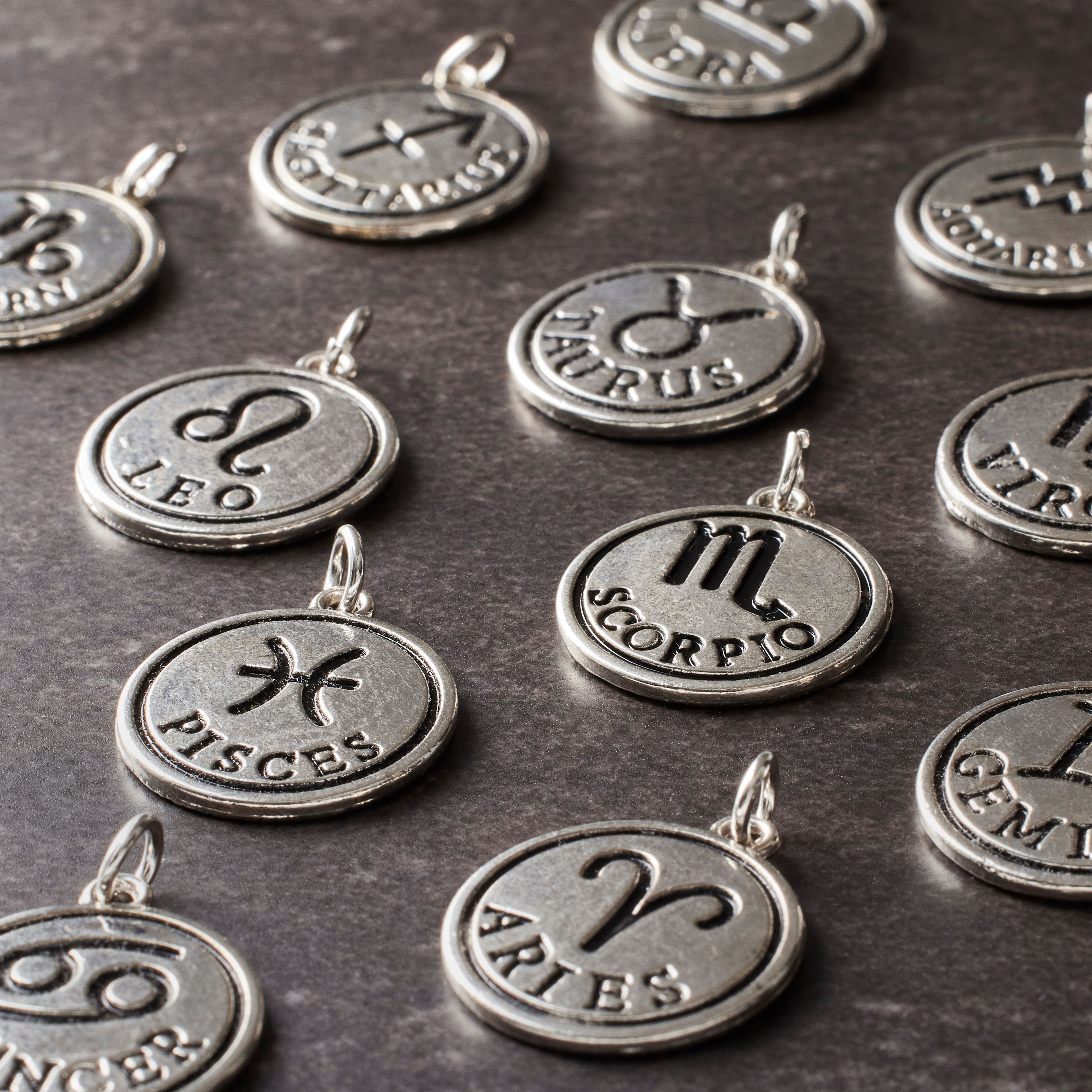 12 Packs: 12 ct. (144 total) Rhodium-Colored Zodiac Charms by Bead Landing™