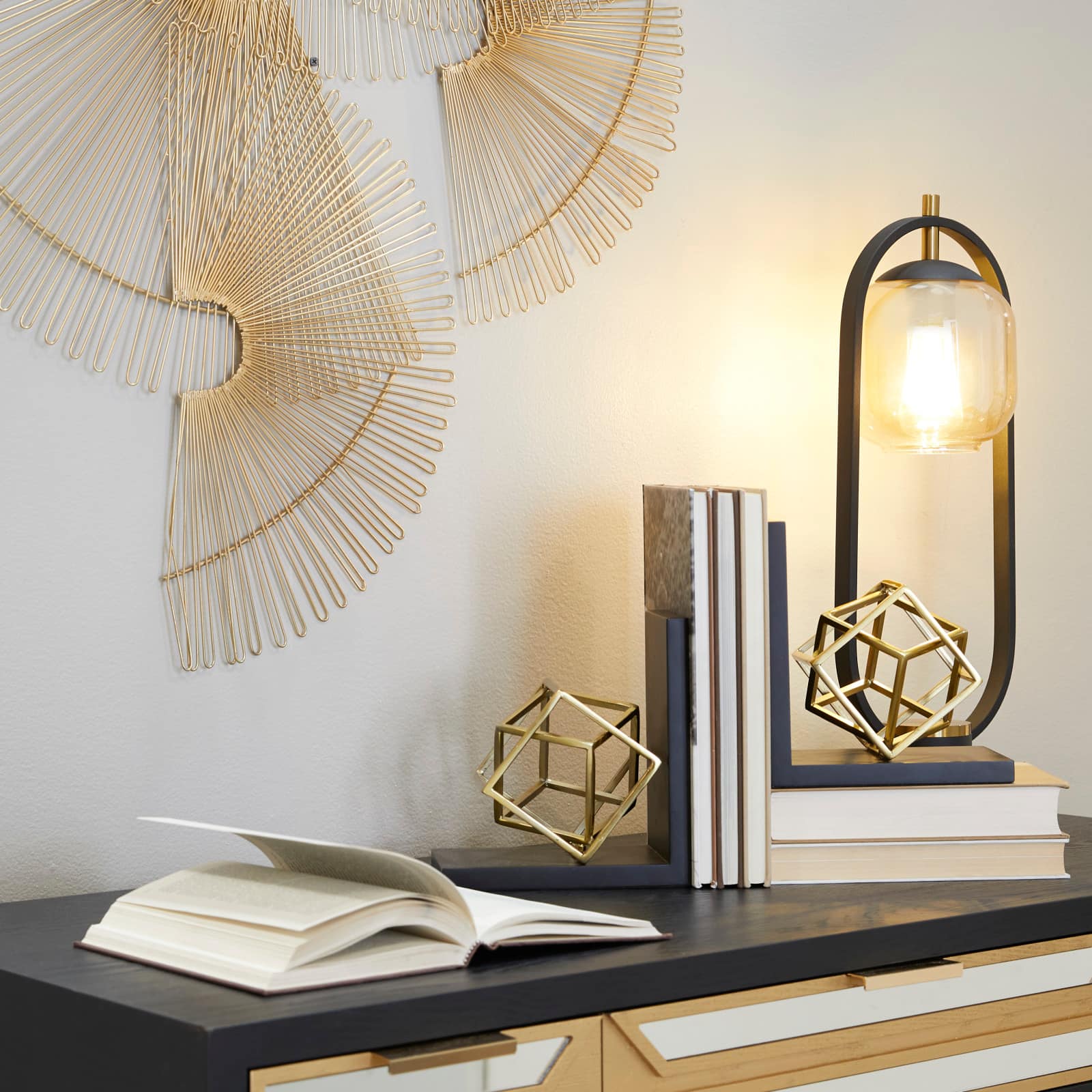 The Novogratz 8&#x22; Gold Stainless Steel Overlapping Cube Geometric Bookends with Black Bases Set