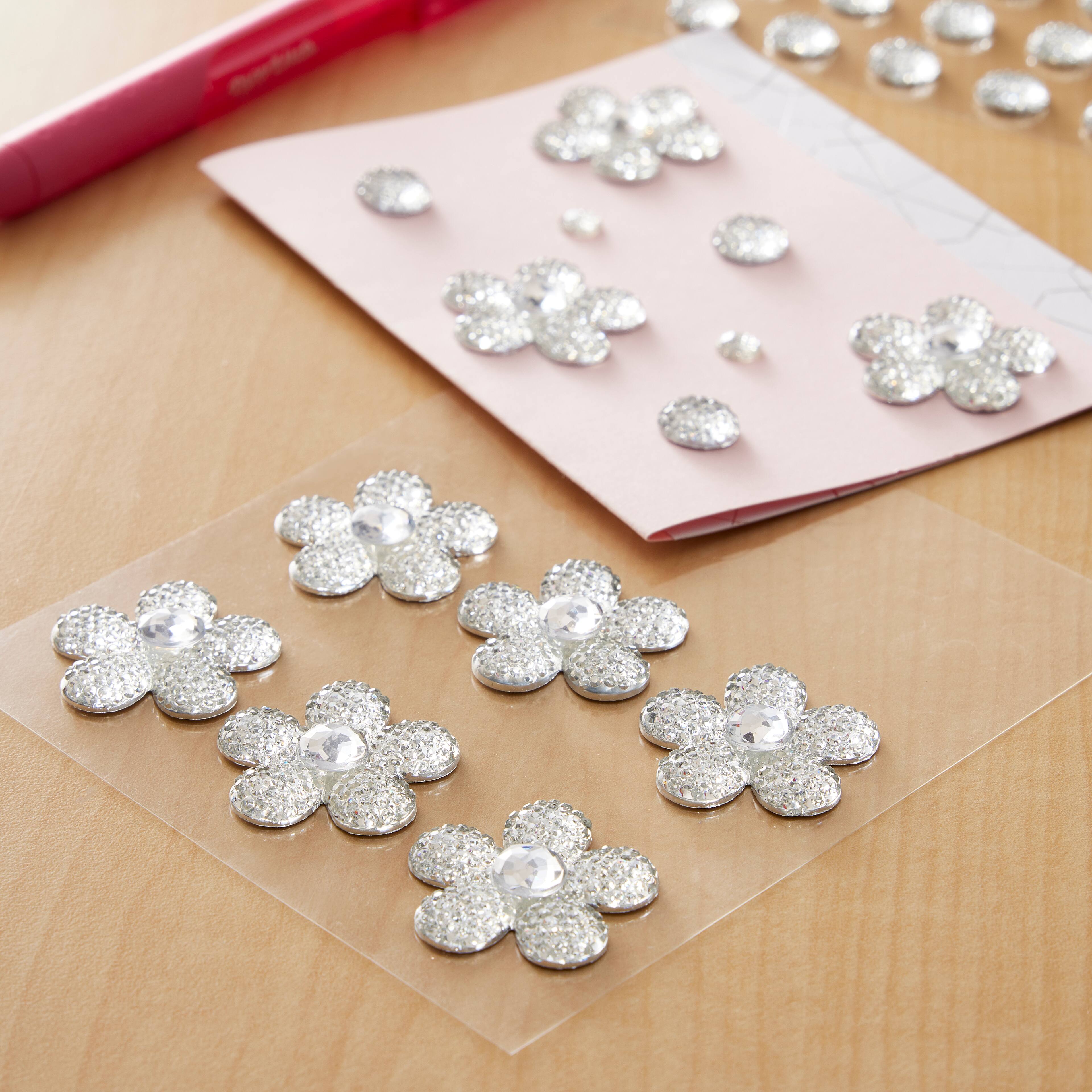 12 Packs: 9 ct. (108 total) Clear Sugar Stone Flower Stickers by Recollections™