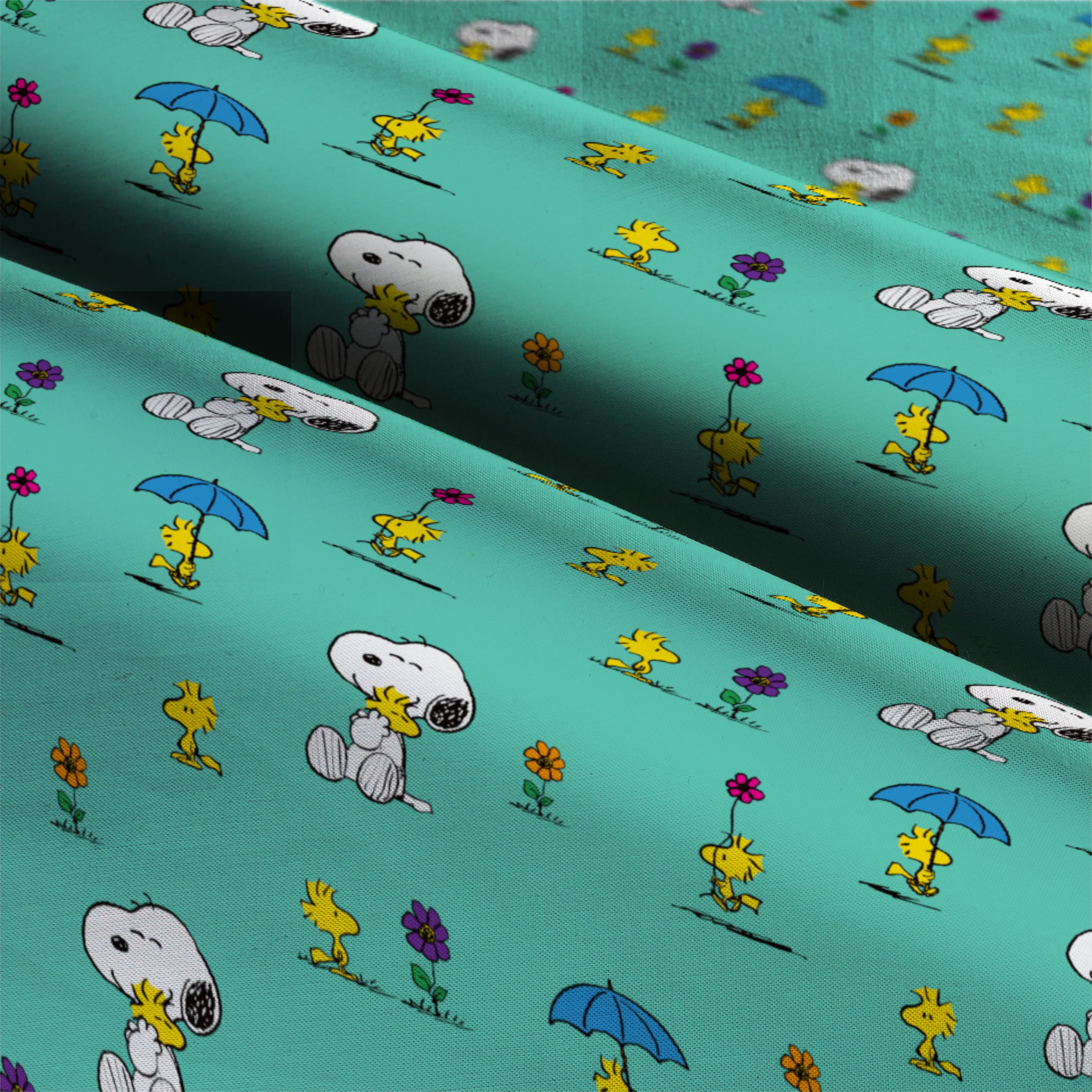 Peanuts® Snoopy & Woodstock Teal Cotton Fabric