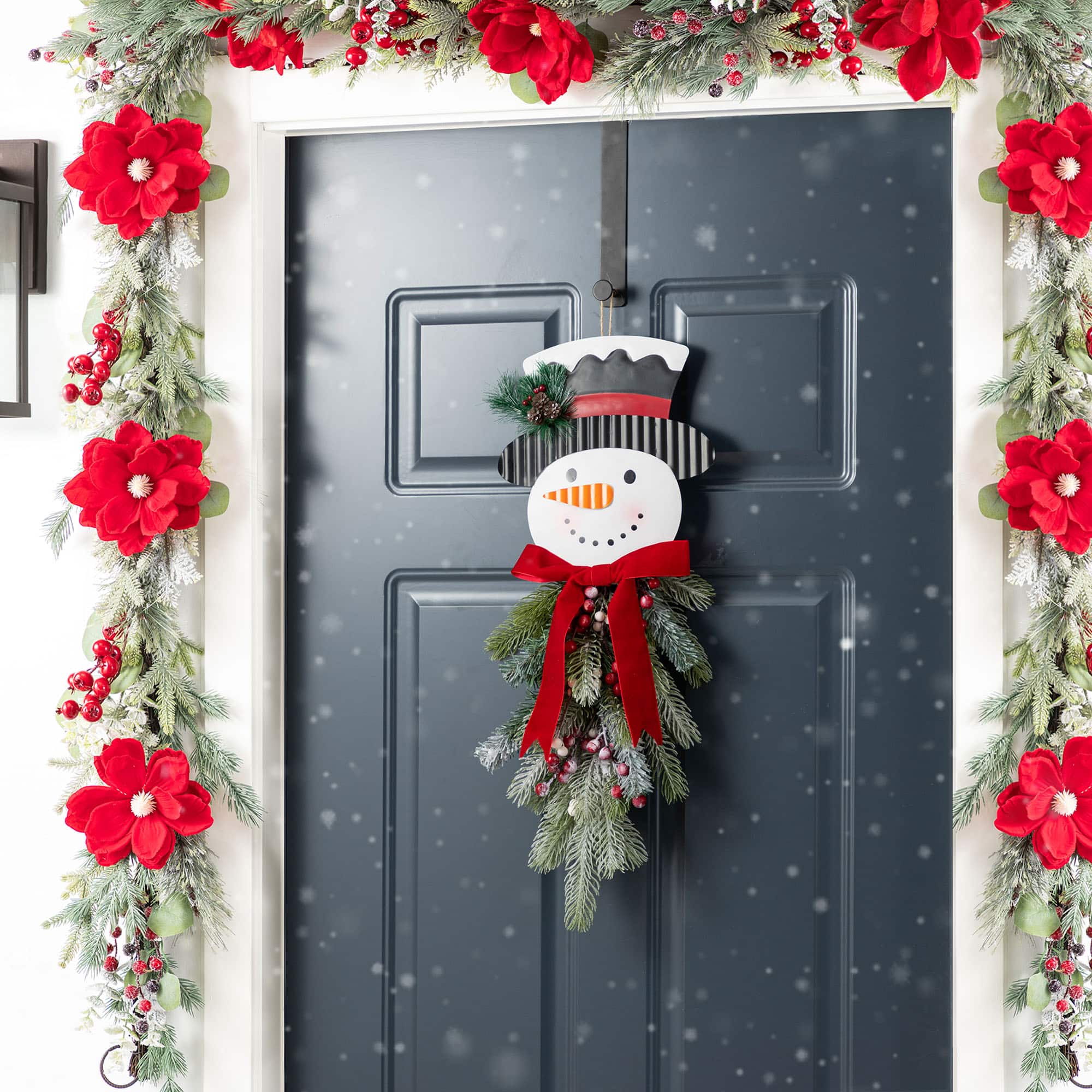 Glitzhome&#xAE; 25&#x22; Greenery Snowman Door Hanger
