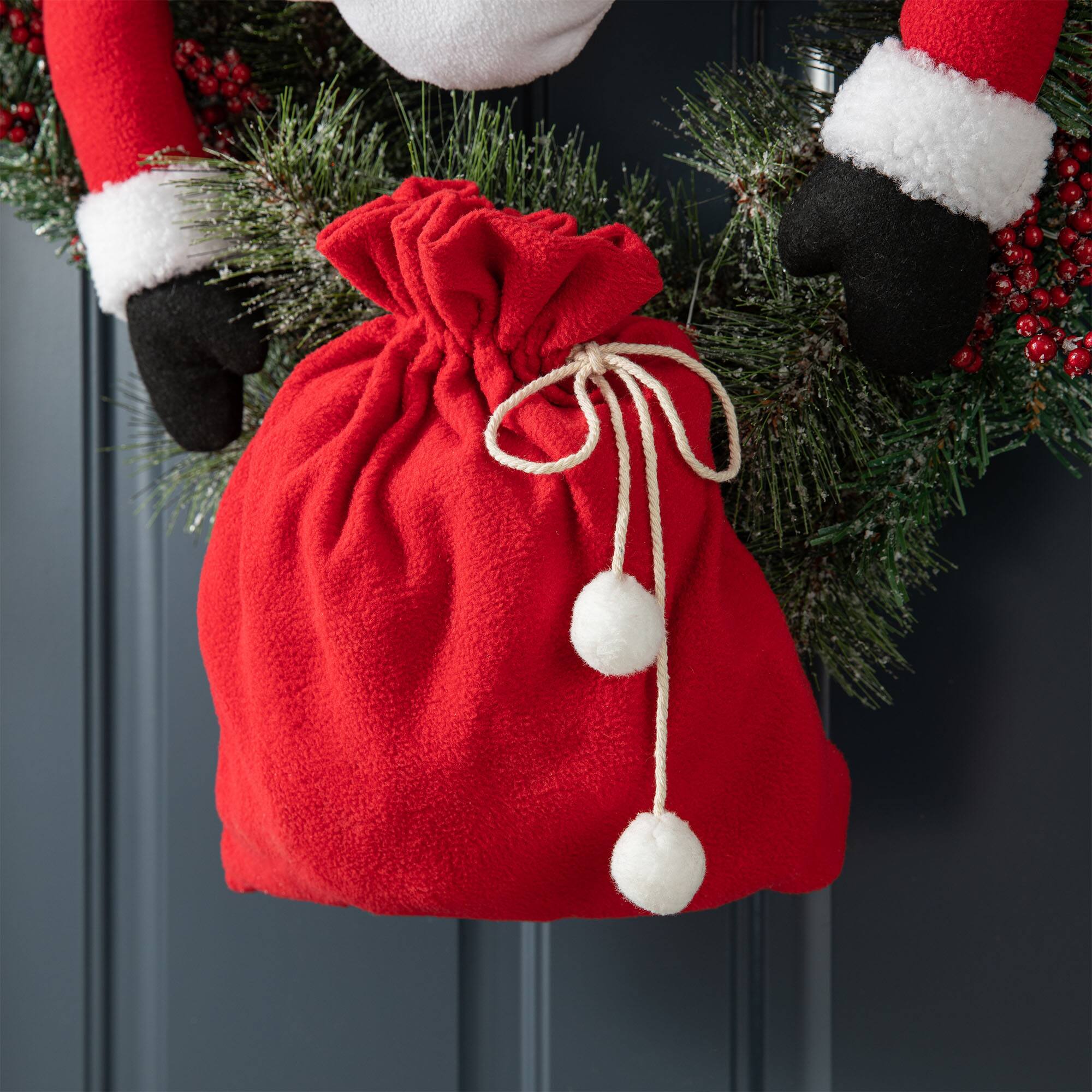 Glitzhome&#xAE; 24&#x22; Santa Flocked Pine Needle &#x26; Berry Wreath