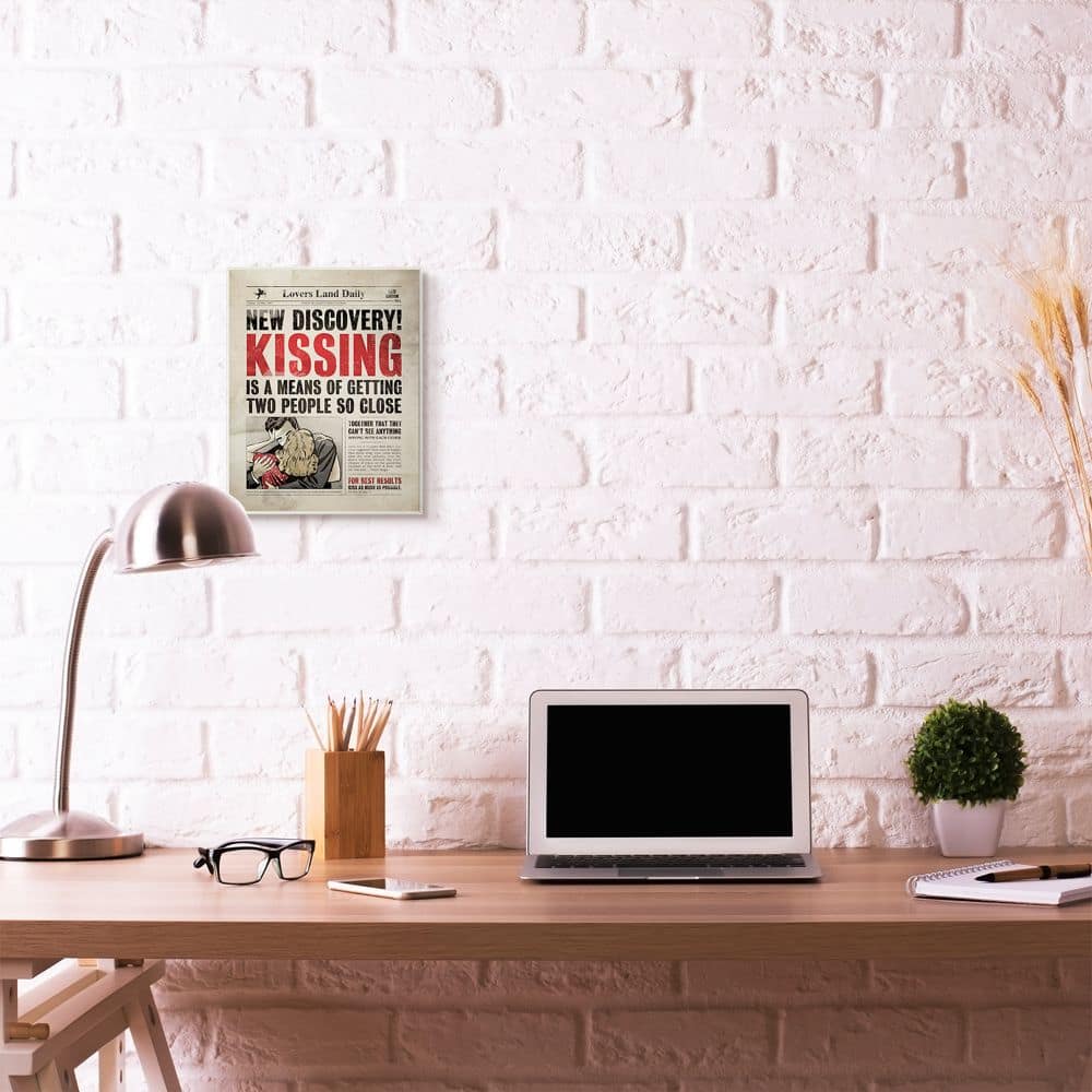 Stupell Industries Kissing Newspaper Wall Plaque