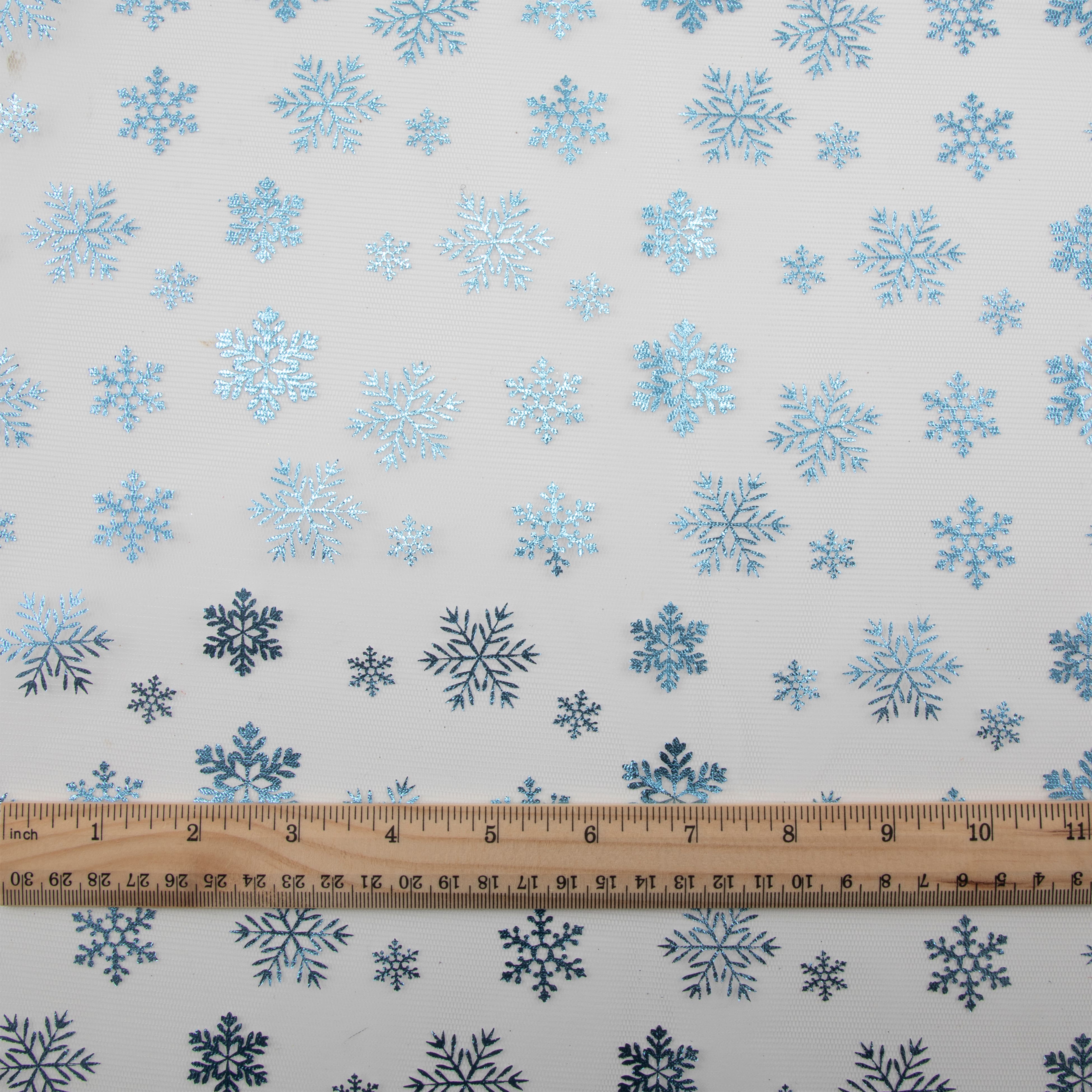 White Mesh with Blue Snowflakes Polyester Fabric