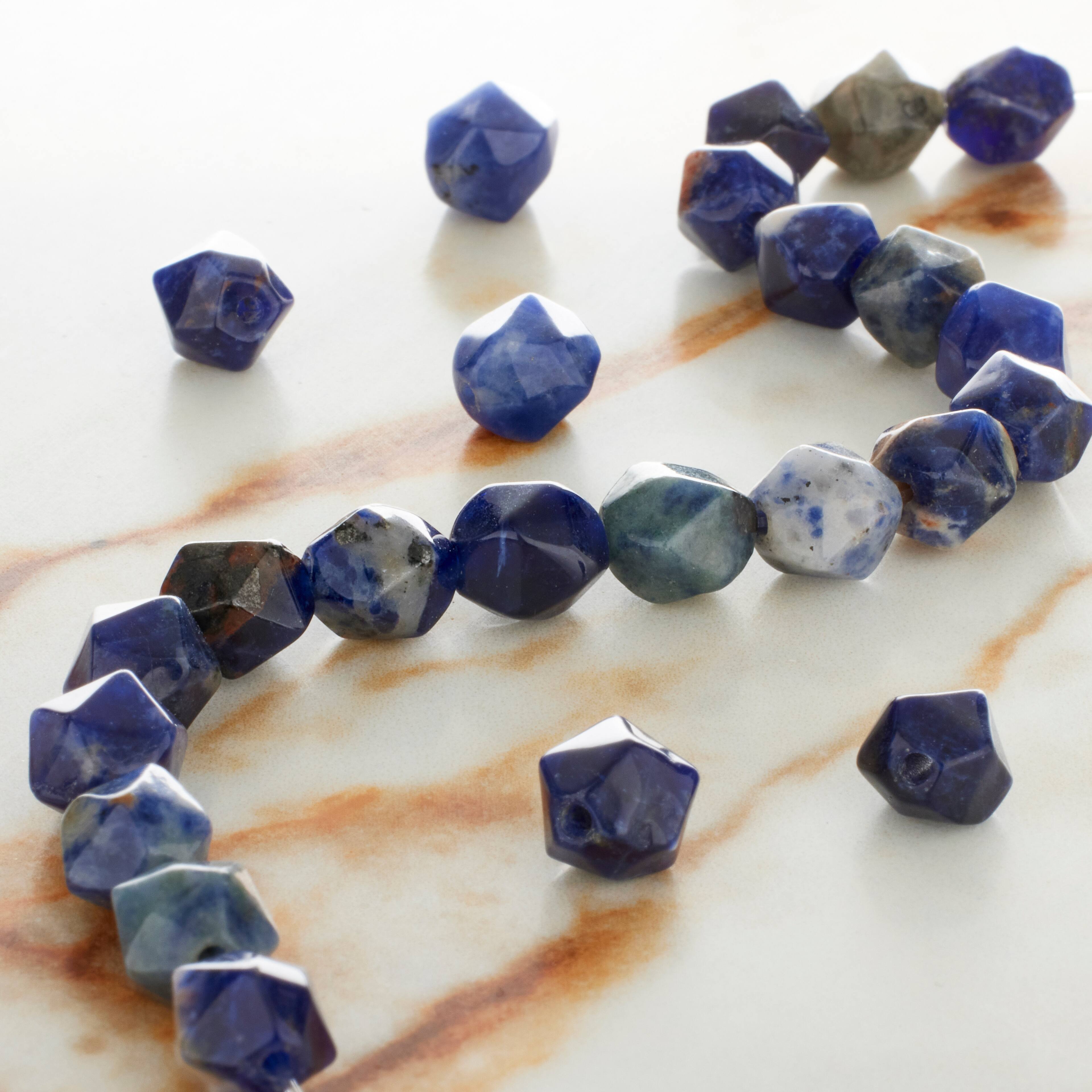 12 Pack: Blue Faceted Sodalite Round Beads, 8mm by Bead Landing™