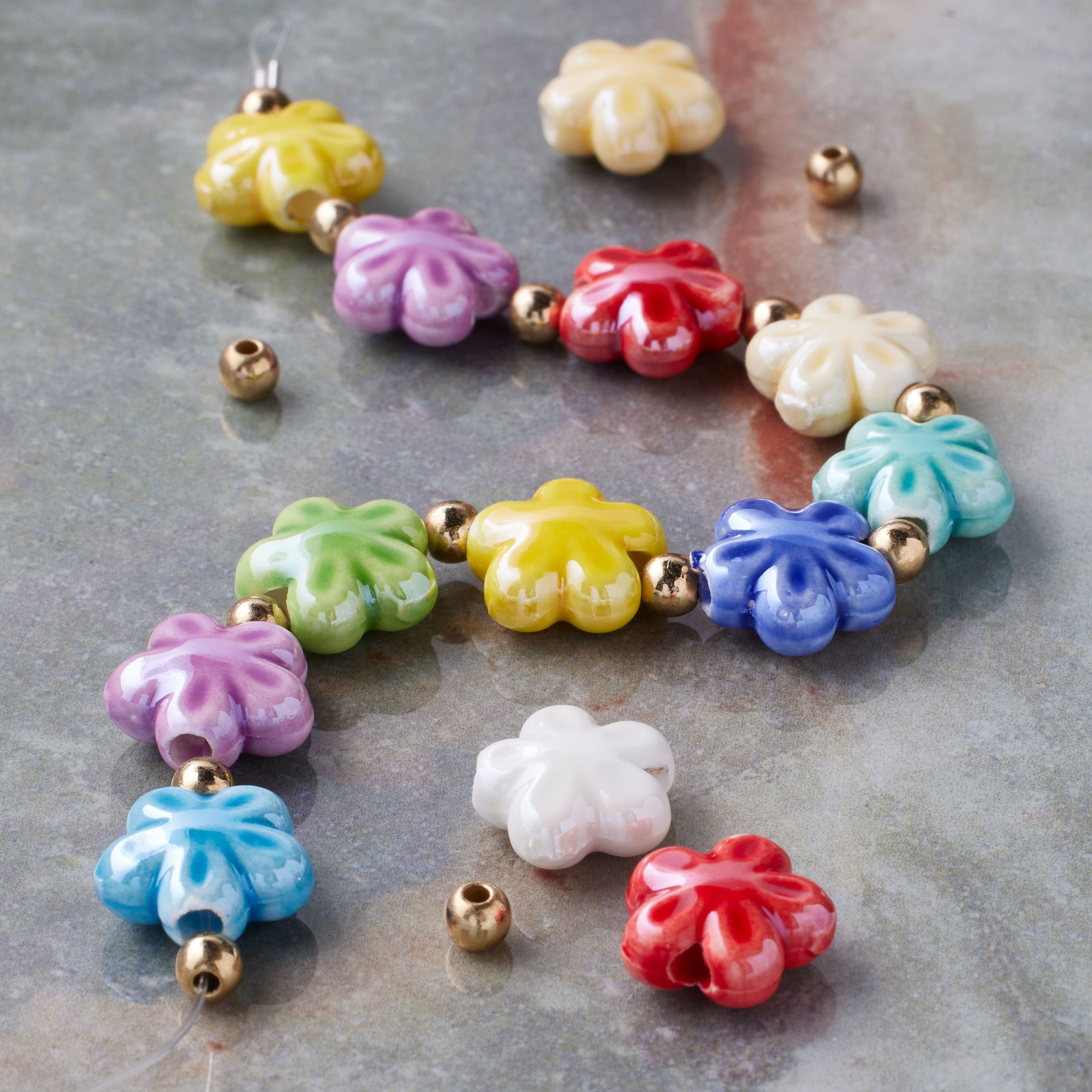12 Packs: 16 ct. (192 total) Multicolor Ceramic Flower Beads, 11mm by Bead Landing™