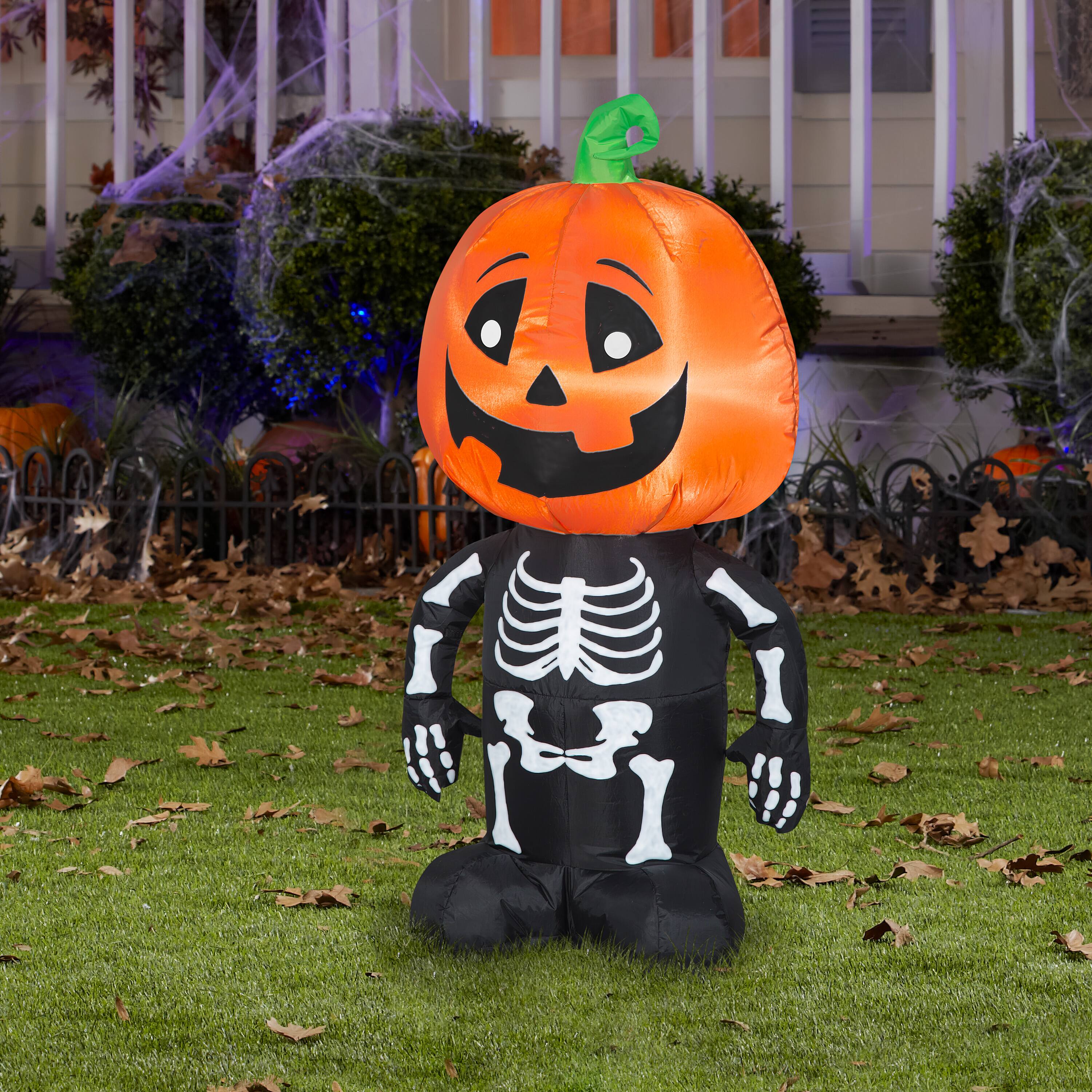 3.5ft. Airblown® Inflatable Happy Pumpkin Boy Skeleton | Michaels