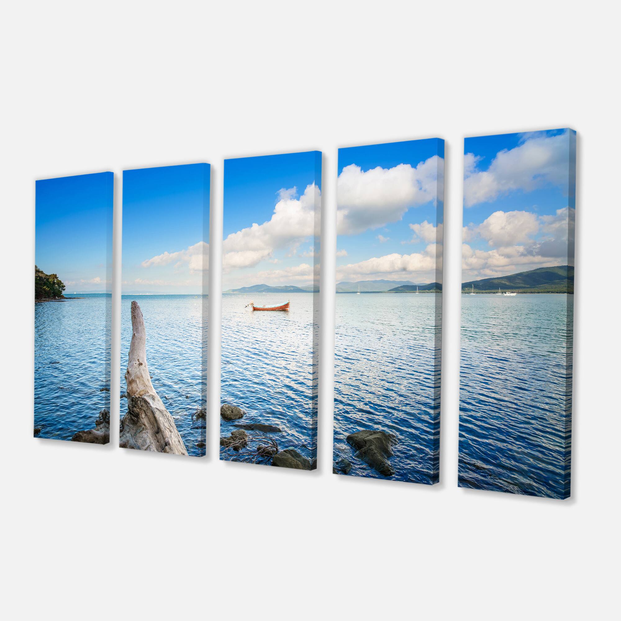 Designart - Small Wooden Boat and Tree Trunk - Extra Large Seashore Canvas Art