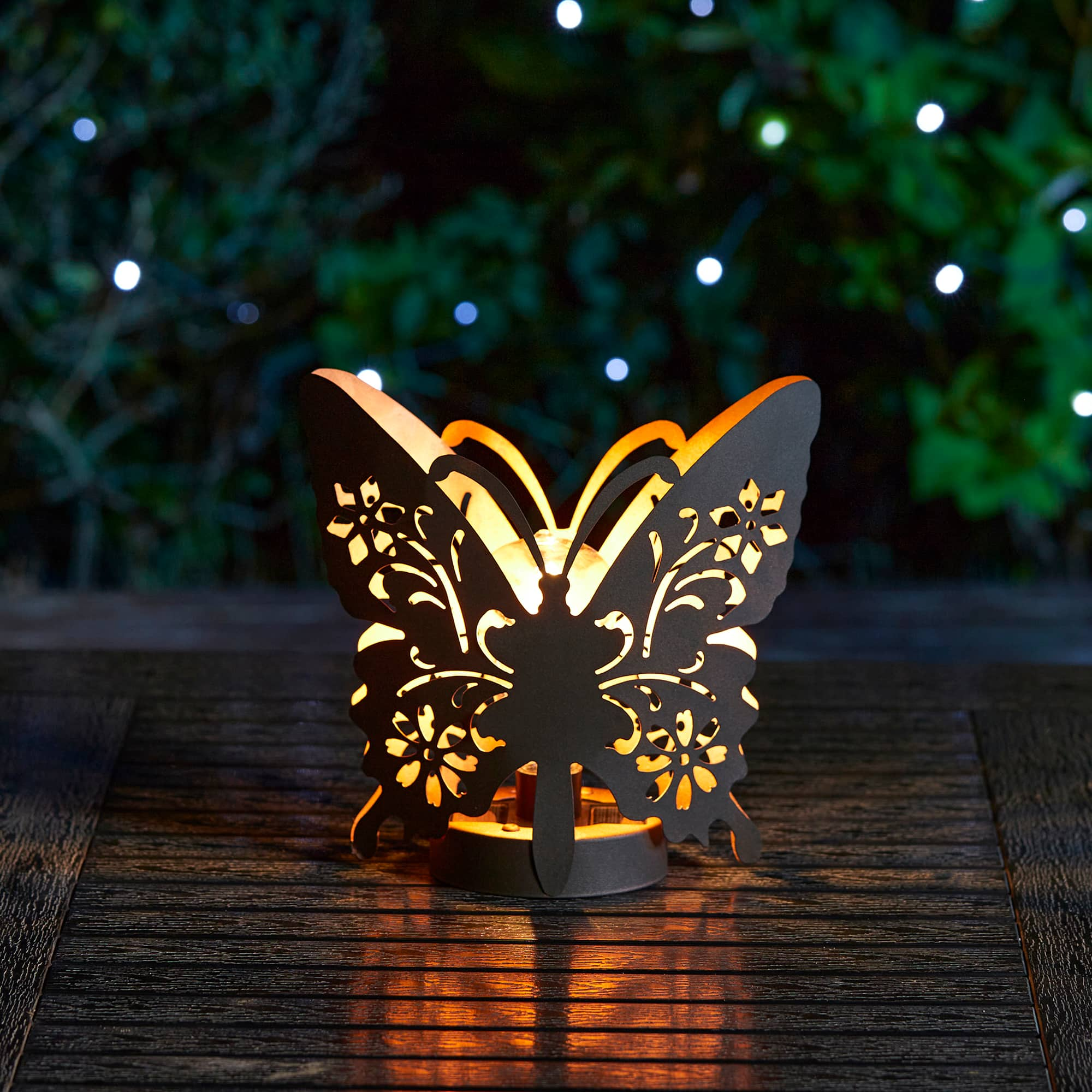 Glitzhome&#xAE; 9&#x22; Metal Flying Butterfly Silhouette Solar Powdered Edison Bulb Outdoor Lanterns, 2ct.