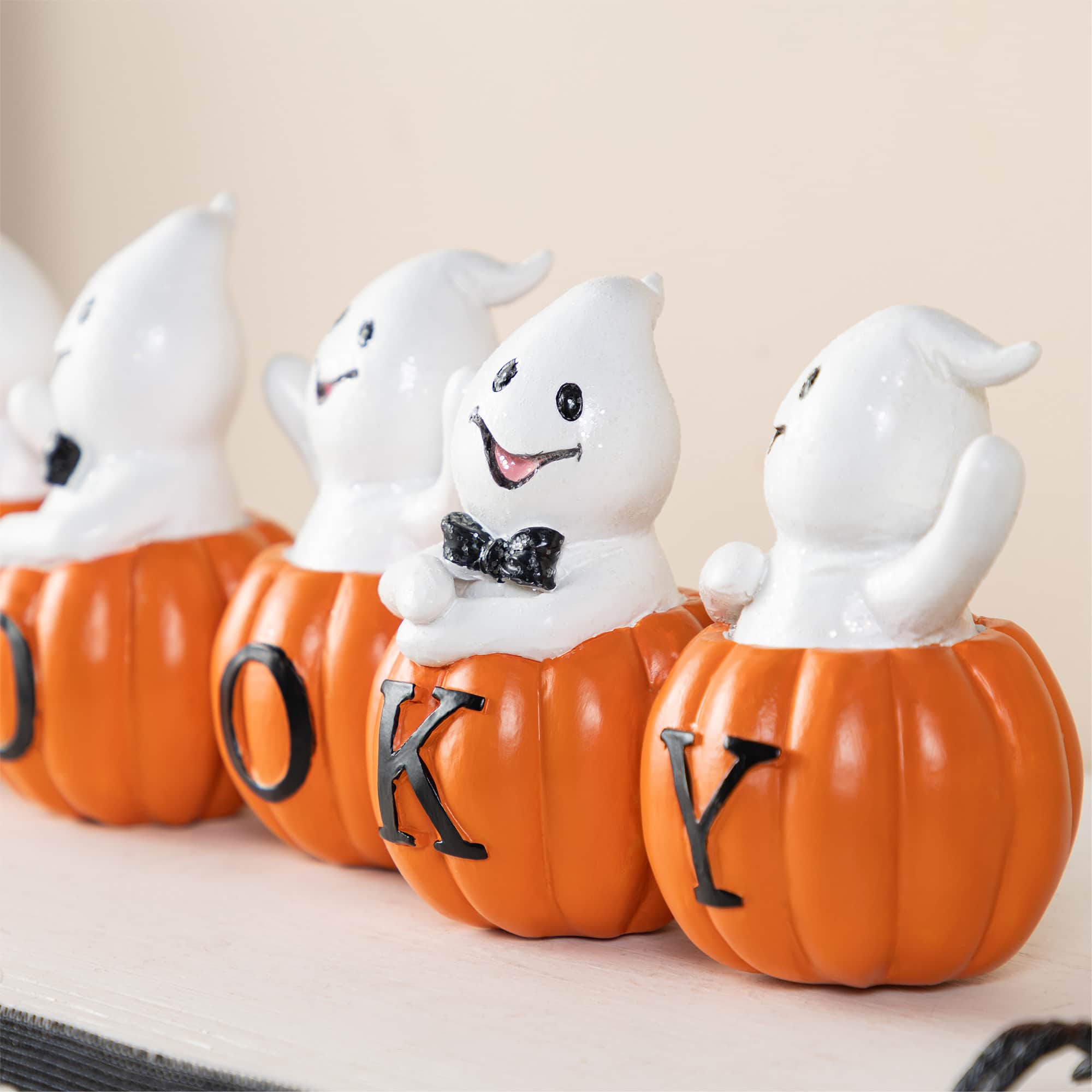 Glitzhome&#xAE; 15.5&#x22;L Halloween Polyresin SPOOKY Ghost Pumpkin Table Decor