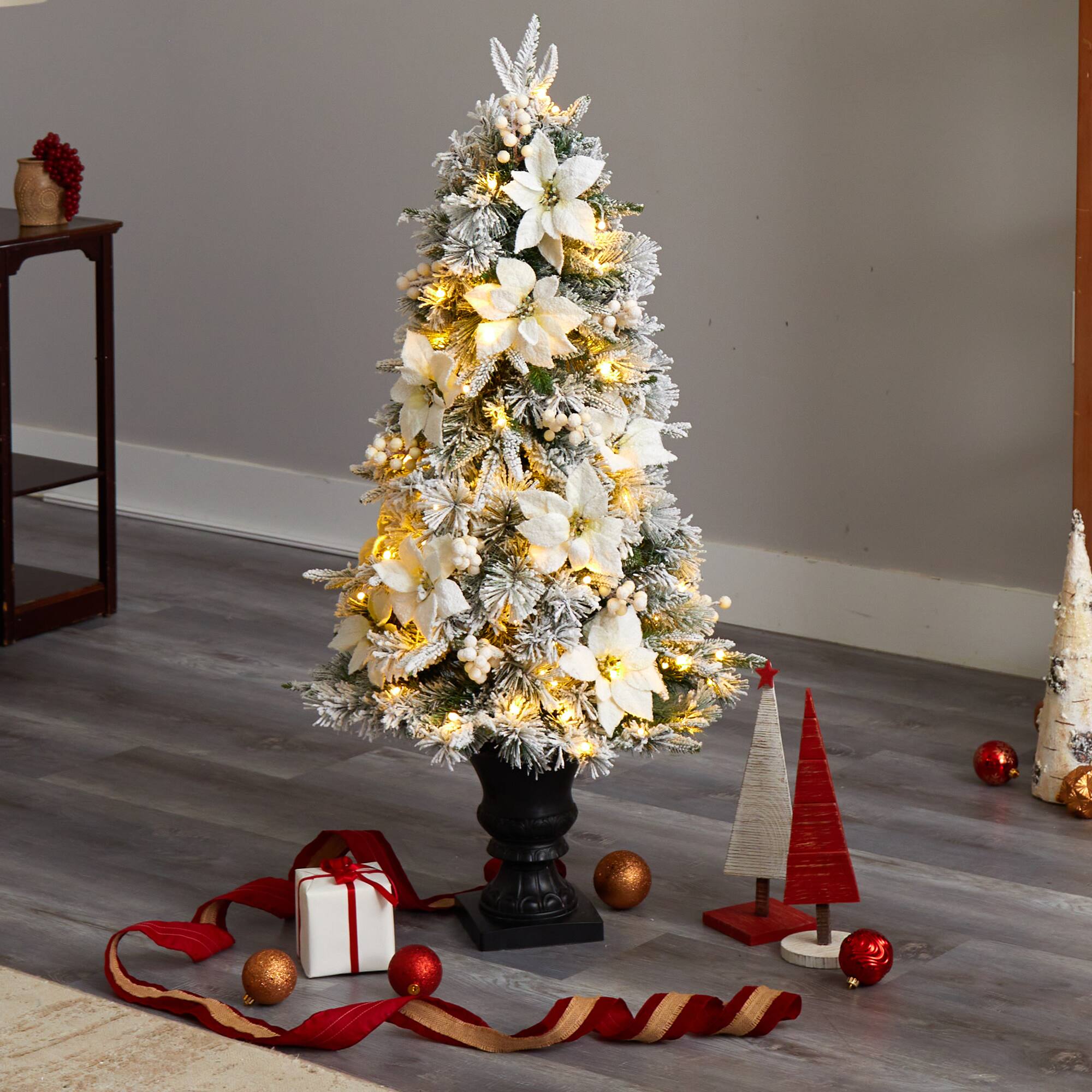 4ft. Pre-Lit Flocked Artificial Christmas Tree in Decorative Urn, Warm White Lights