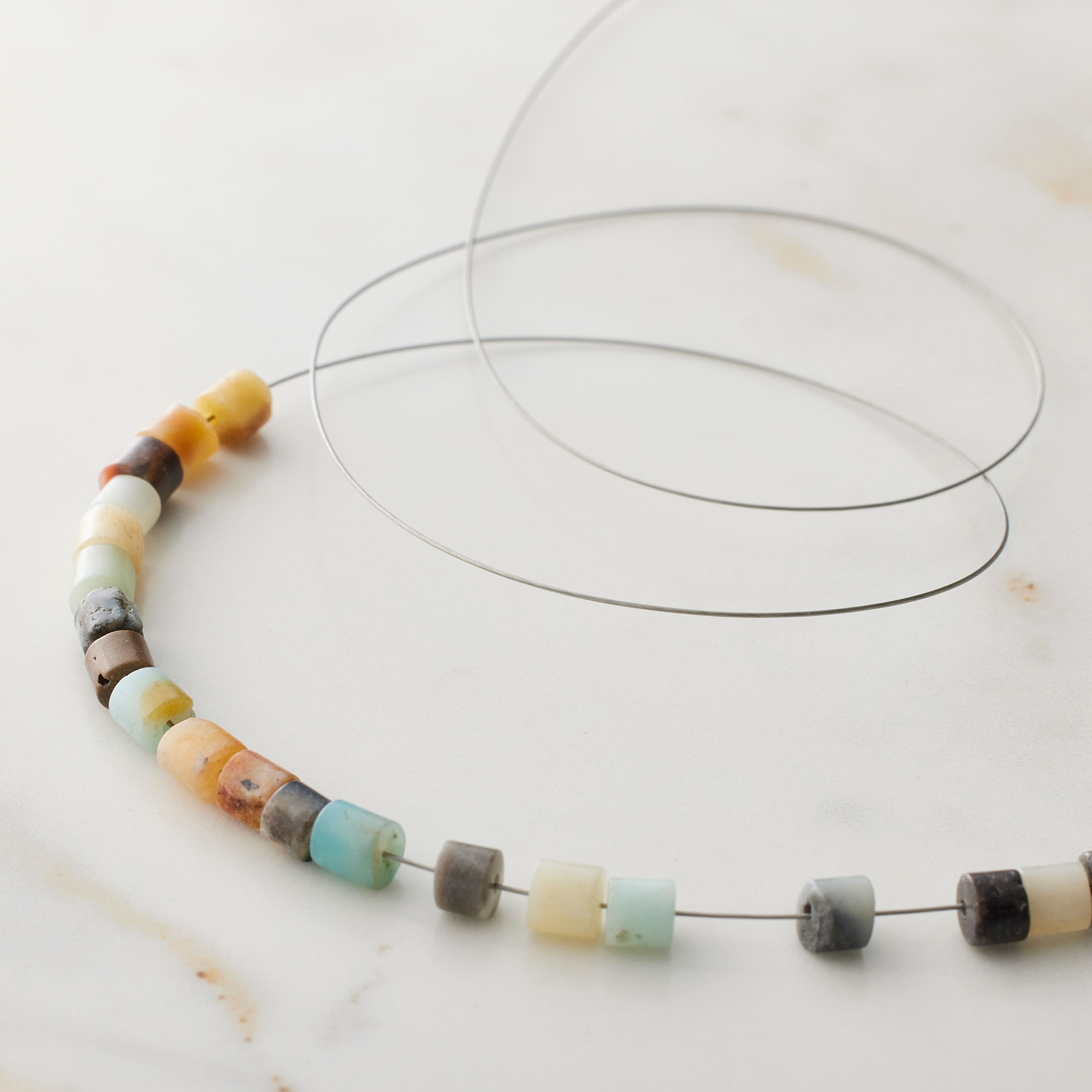 12 Pack: Beadalon® Bright 7 Strand Bead Stringing Wire, 200ft.