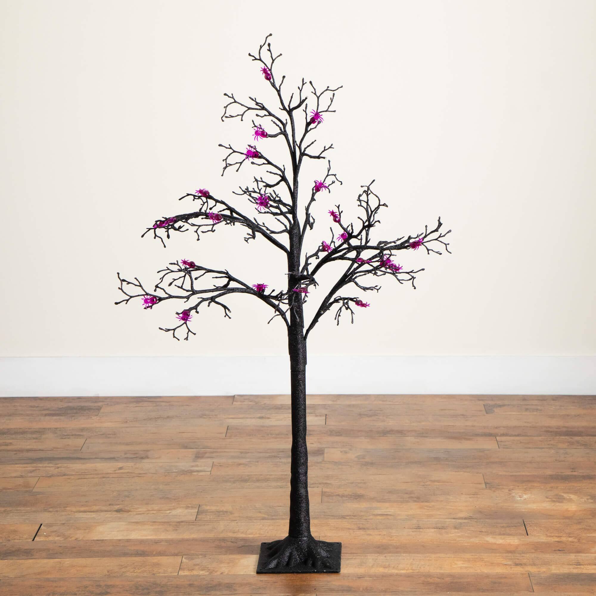 4ft. Pre-Lit Artificial Halloween Spider Twig Tree with 48 Purple LED Lights