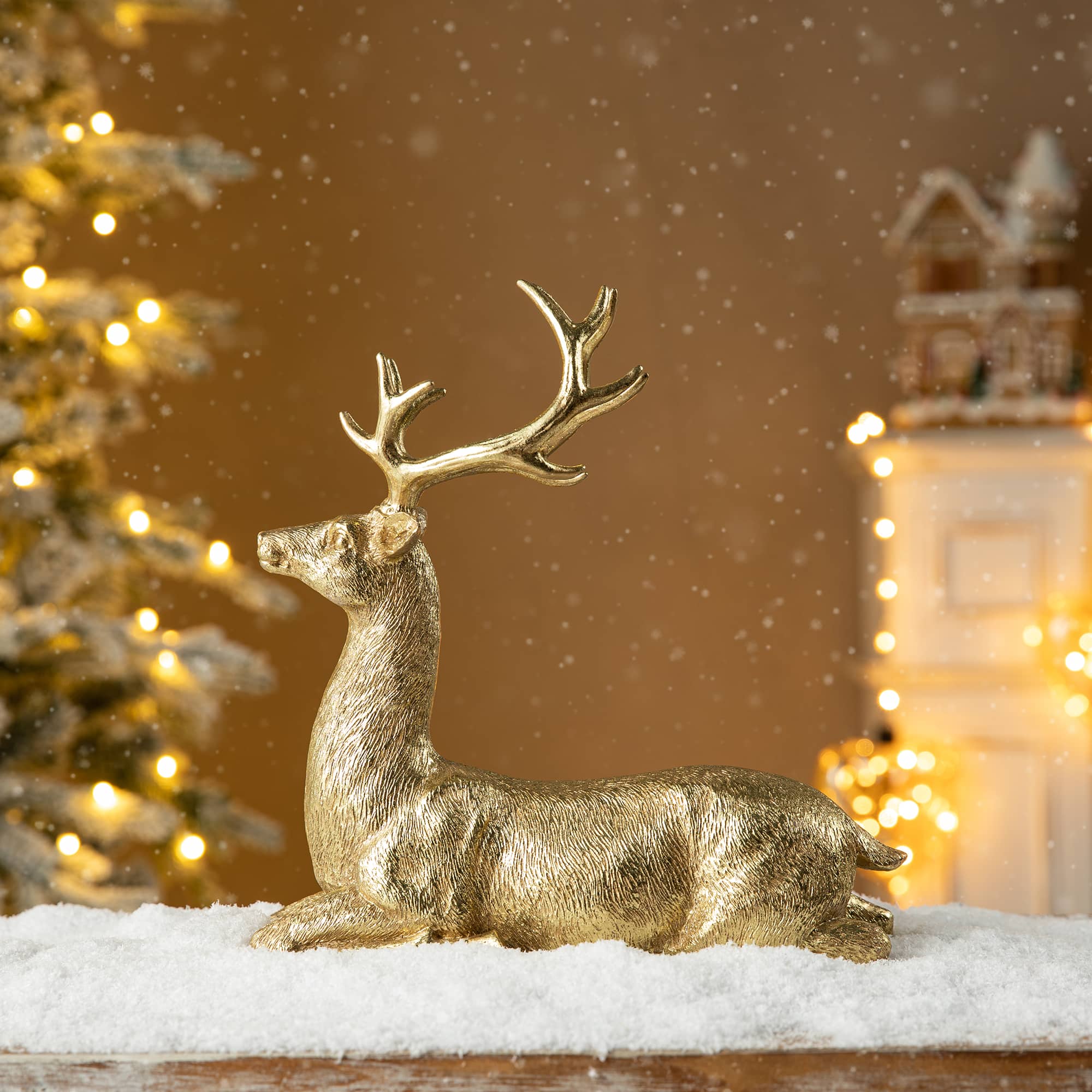 Glitzhome® 11" Lying Reindeer Table Décor
