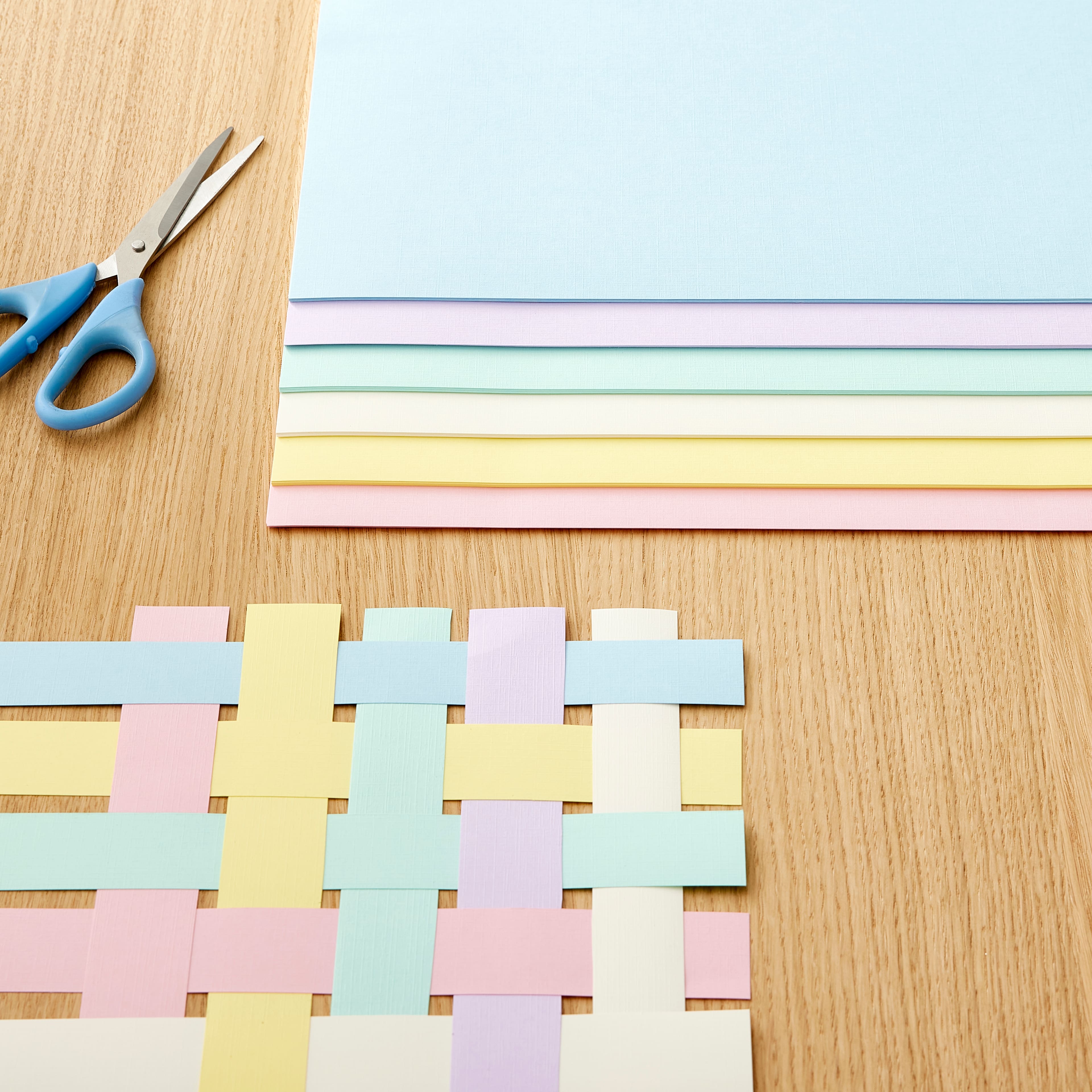 9 Packs: 60 ct. (540 total) Pastel Hues 12" x 12" Linen Texture Cardstock by Recollections™