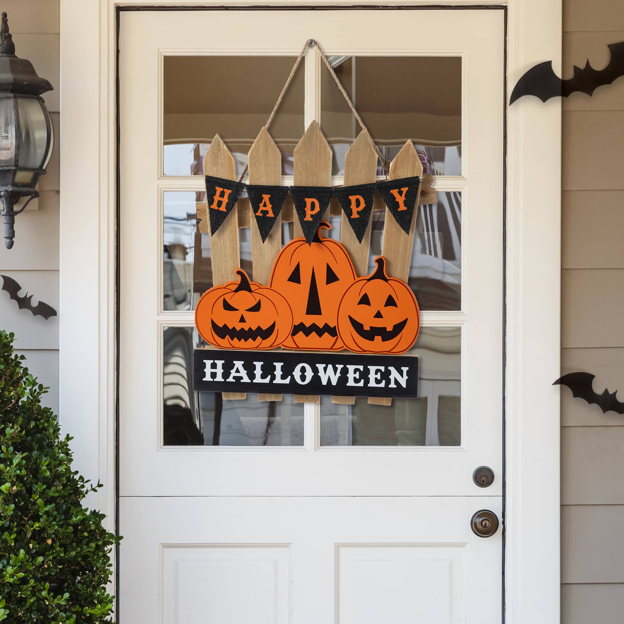 Glitzhome&#xAE; 14&#x22;H Halloween Wood Jack O Lantern Door Hanger