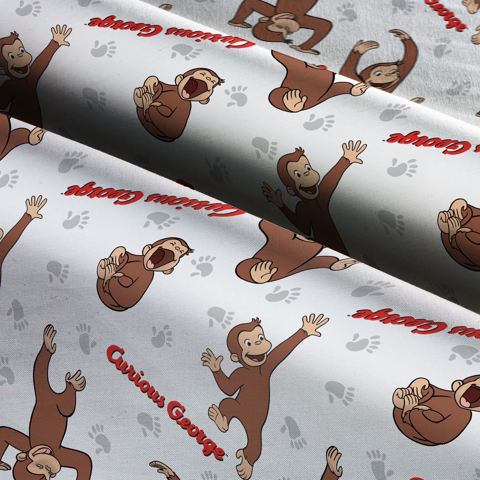 Universal Studios™ Curious George Footprint Cotton Fabric