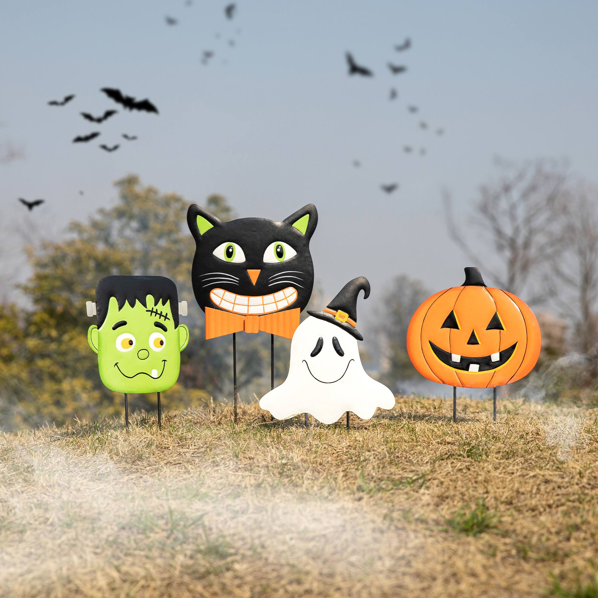 Glitzhome&#xAE; 3.5ft. Halloween Metal Stacked Ghost, Frankenstein, Black Cat and Pumpkin Yard Stake