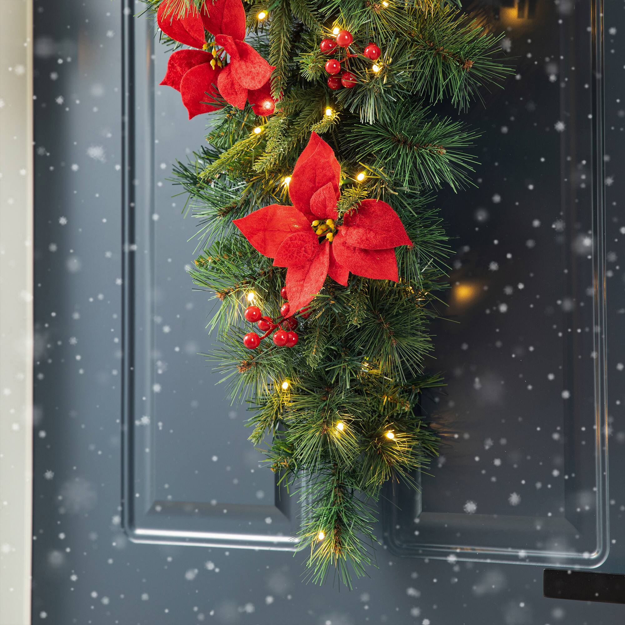 Glitzhome&#xAE; 3ft. Pre-Lit Pine, Poinsettia &#x26; Berries Christmas Teardrop Swag