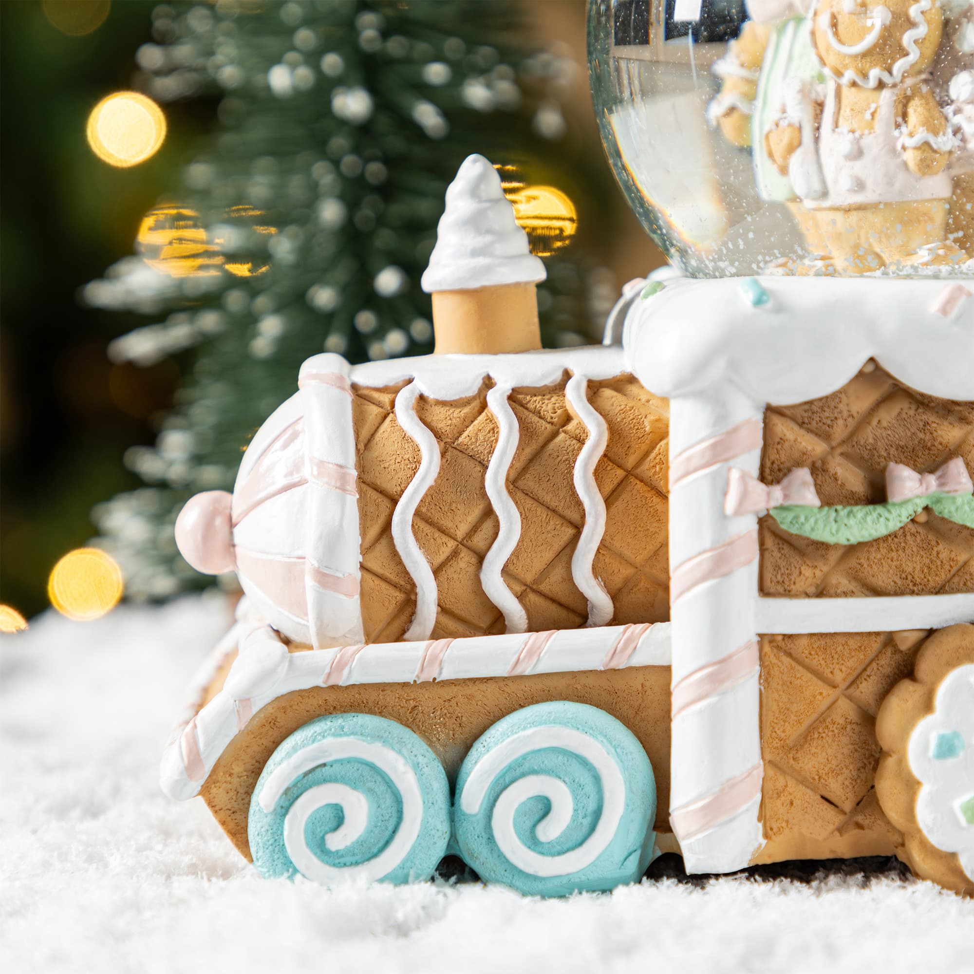Glitzhome&#xAE; 100mm Christmas Resin Musical Snowflakes Ginginerbread Family Train Waterglobe
