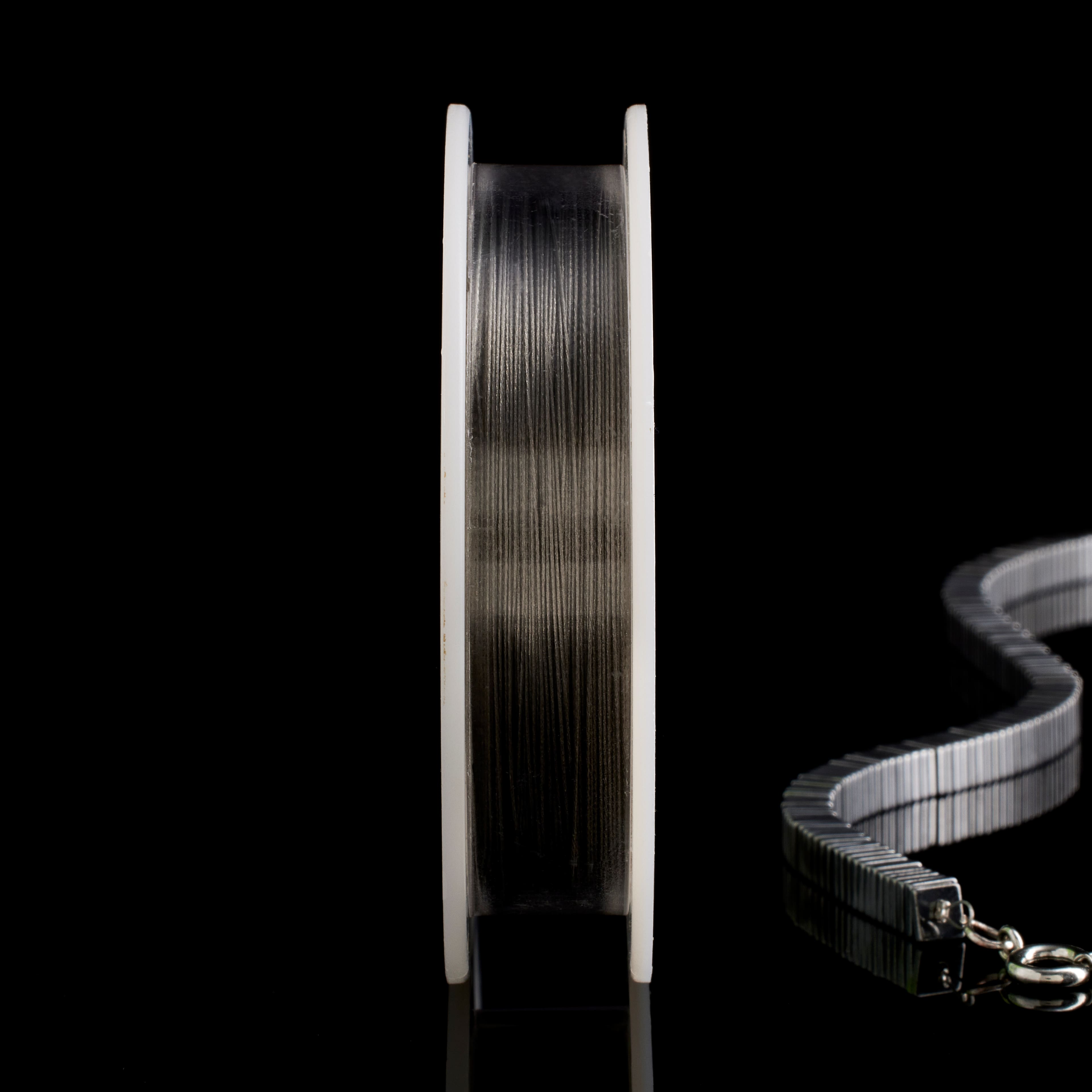 12 Pack: Beadalon® 0.012" Bright 7 Strand Bead Stringing Wire