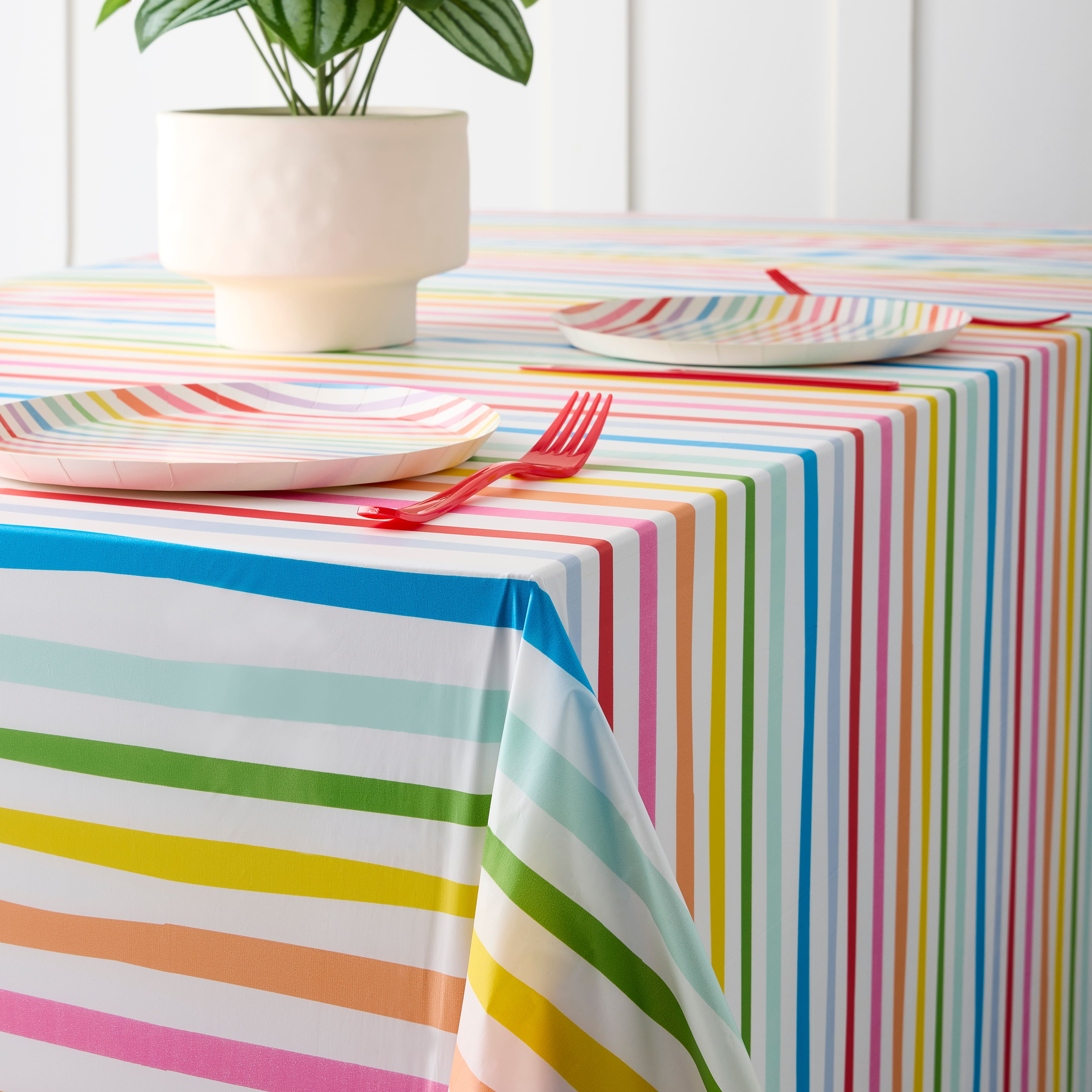 12 Pack: 108&#x22; Rainbow Plastic Table Cover by Celebrate It&#x2122;