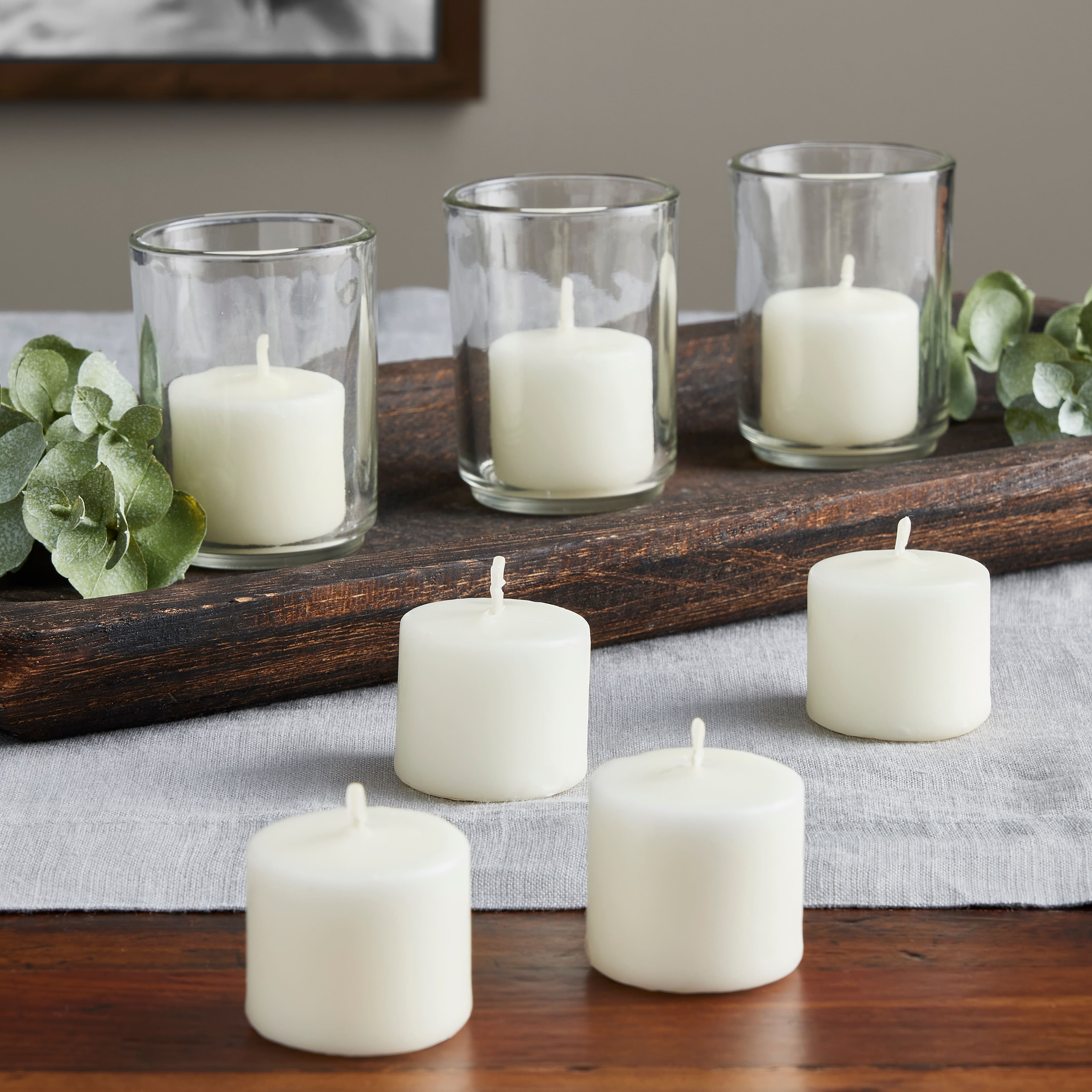 12 Packs: 24 ct. (288 total) Basic Elements&#x2122; Ivory Votive Candles by Ashland&#xAE;