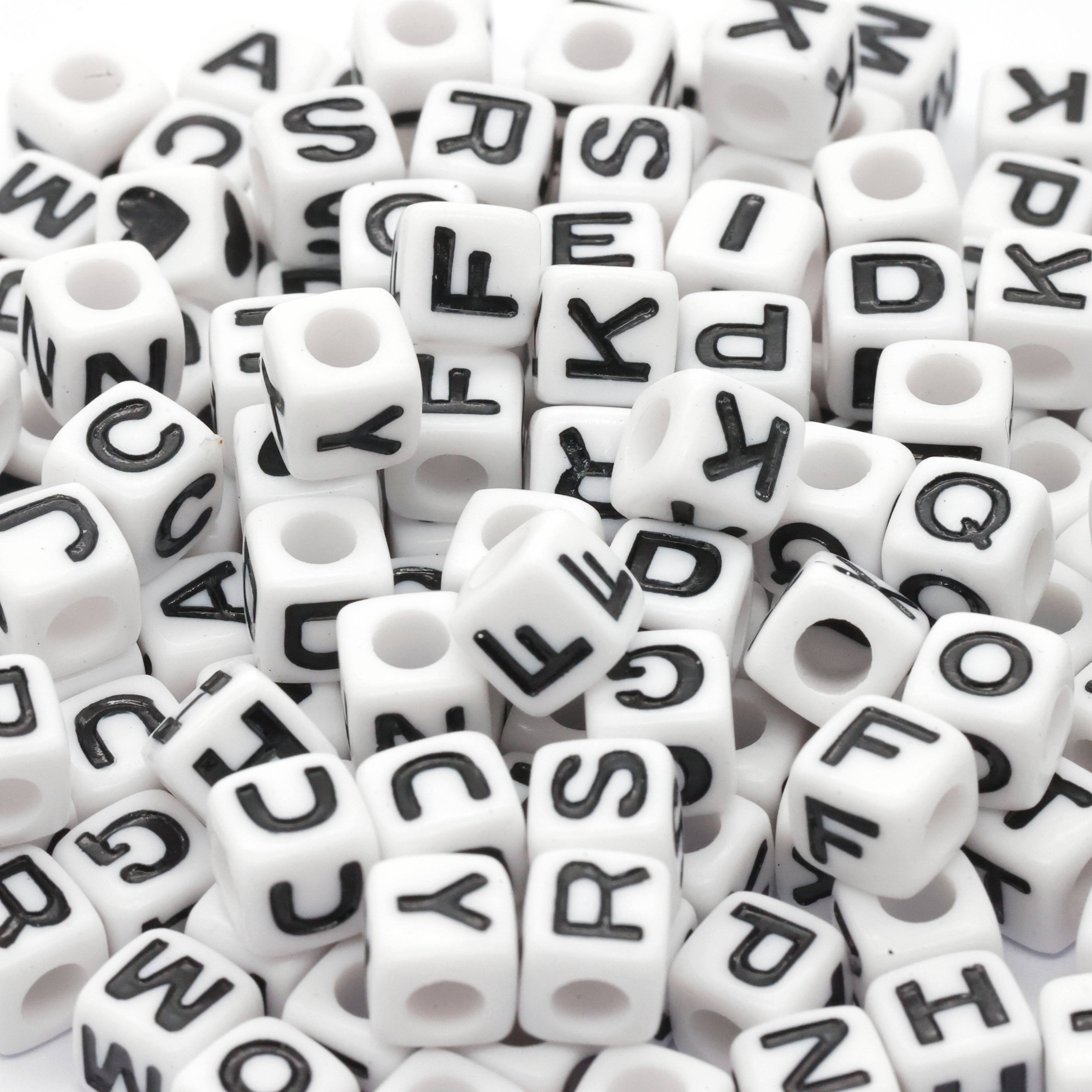 12 Packs: 340 ct. (4,080 total) Black & White Alphabet Beads by Creatology™, 6.5mm