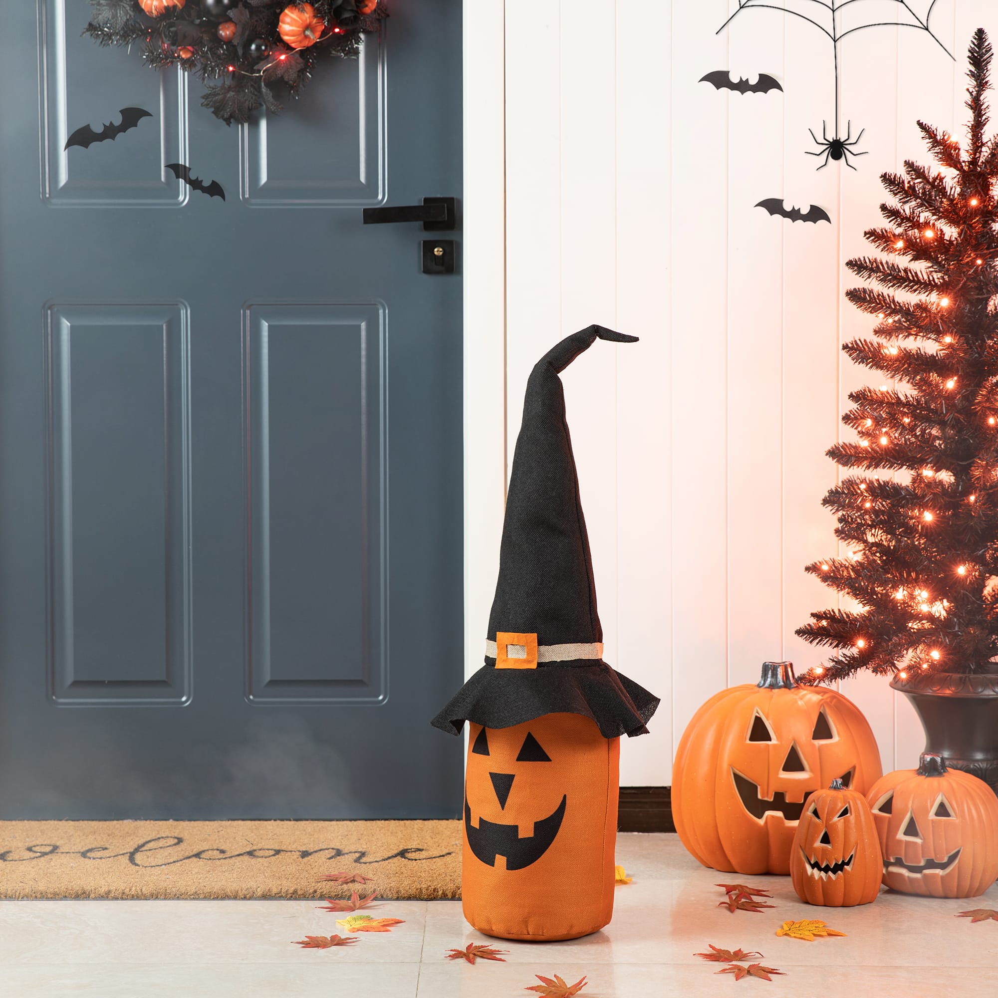 Glitzhome&#xAE; 24&#x22; Linen Halloween Jack-O&#x27;-Lantern Doorstop Porch D&#xE9;cor